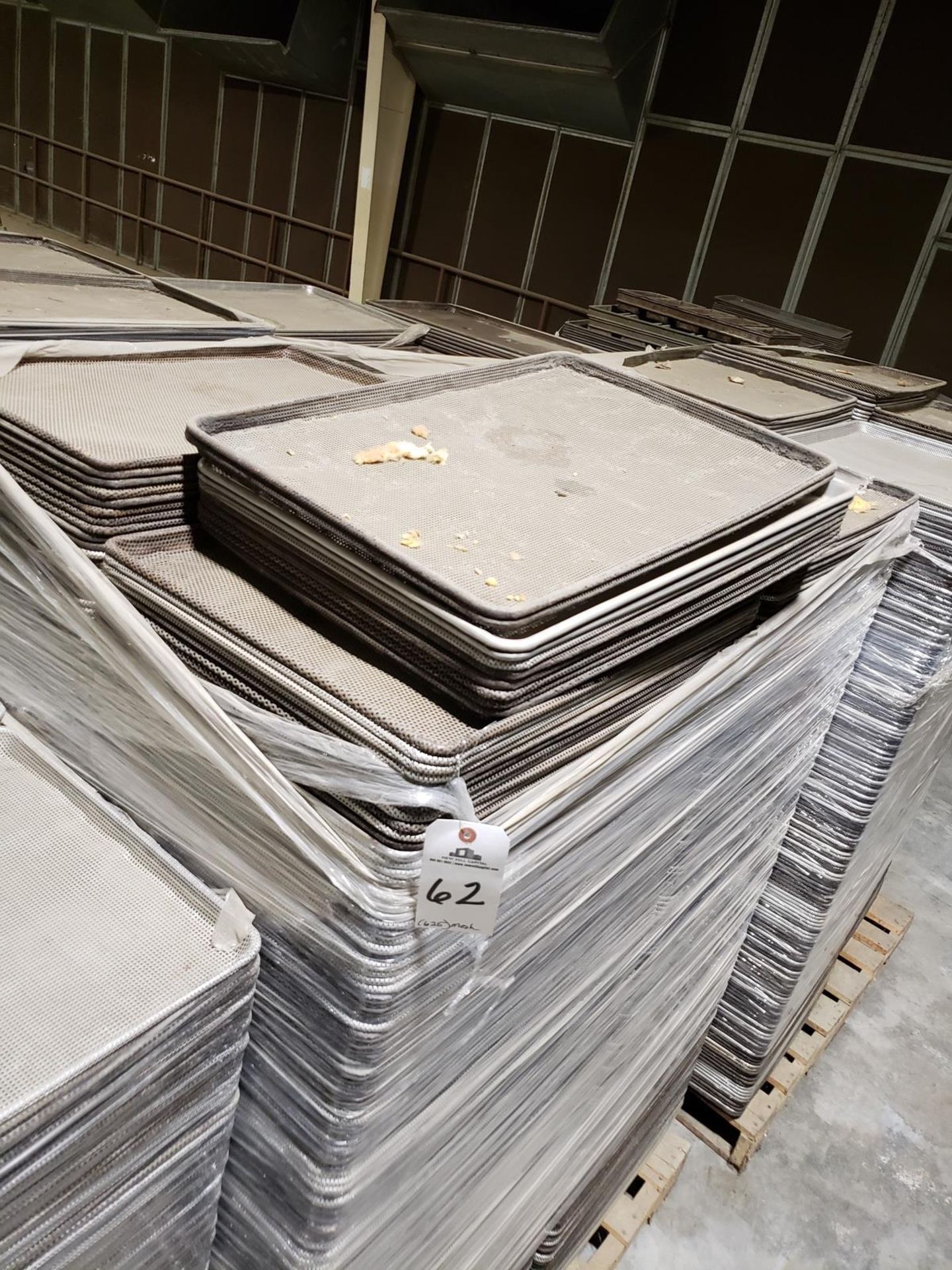 Lot of (625) Perforated Baking Sheets | Rig Fee: $100