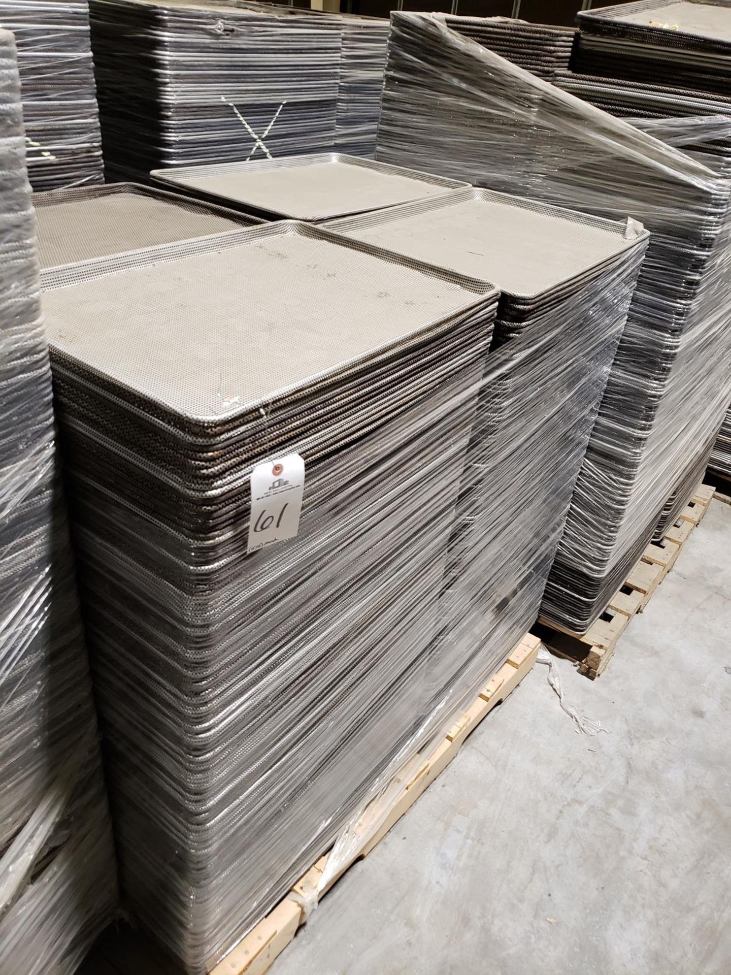 Lot of (510) Perforated Baking Sheets | Rig Fee: $100