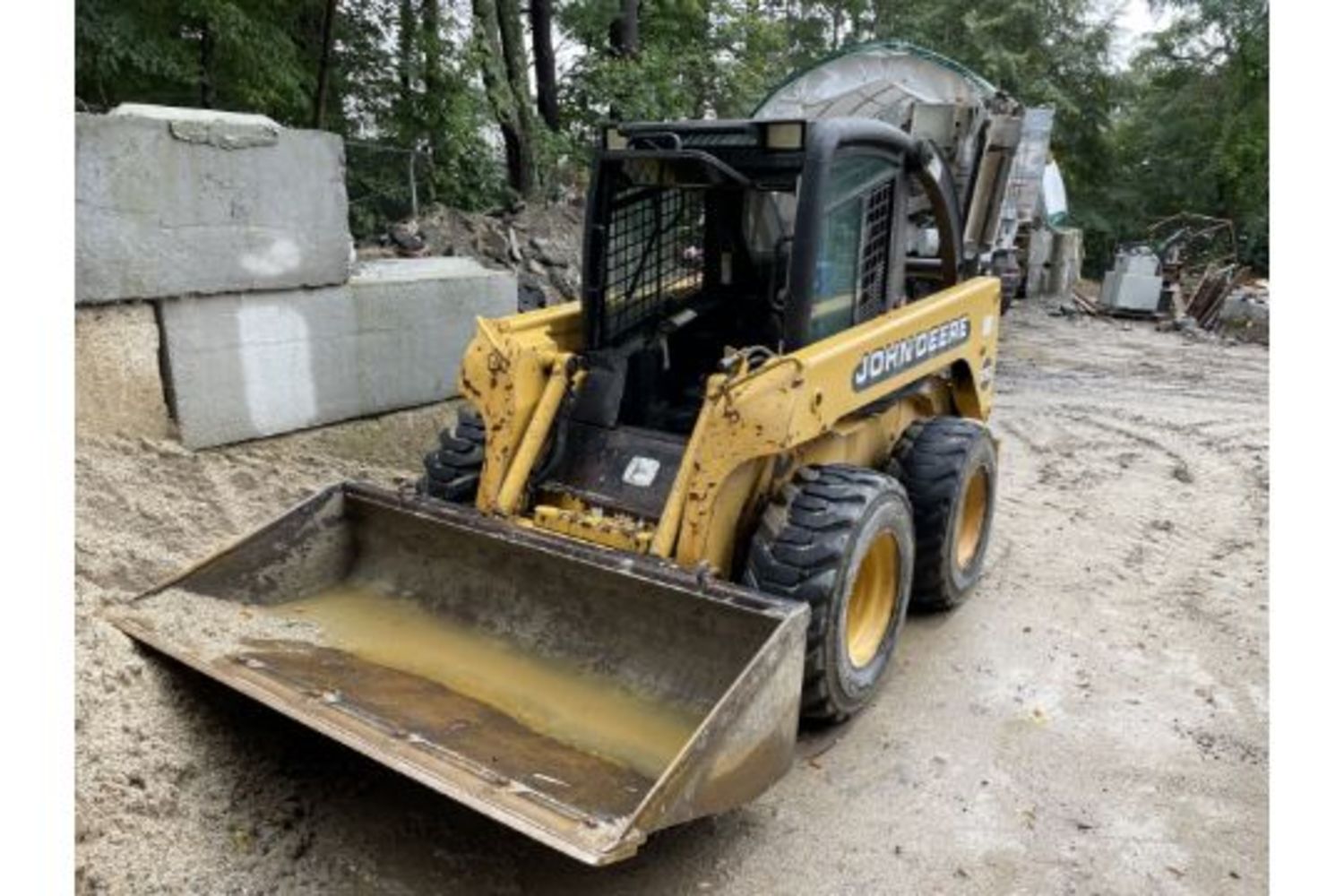 PLATFORM TRUCK - CEMENT TRUCK - JD SKID STEER - (2) HEATER TRAILERS - NEW STONE VENEER - NEW SKID STEER ATTACHMENTS