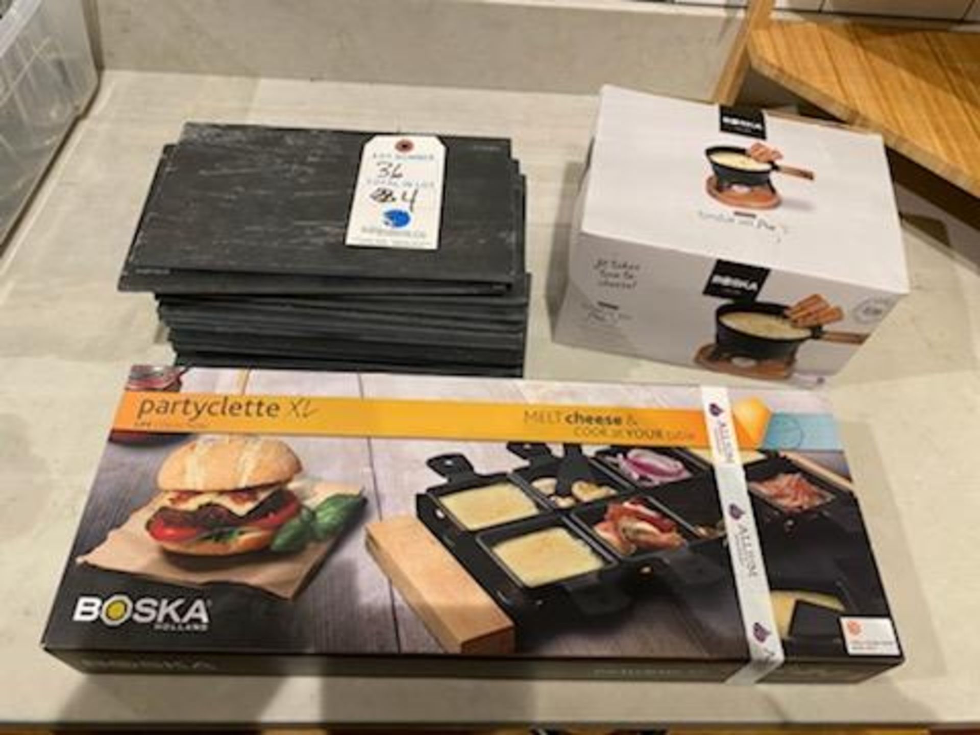{LOT} Cheese Accessories c/o: Boska Fondu Set (NEW), Raclette Set (NEW) & (17) Boska Slate Cheese Pl