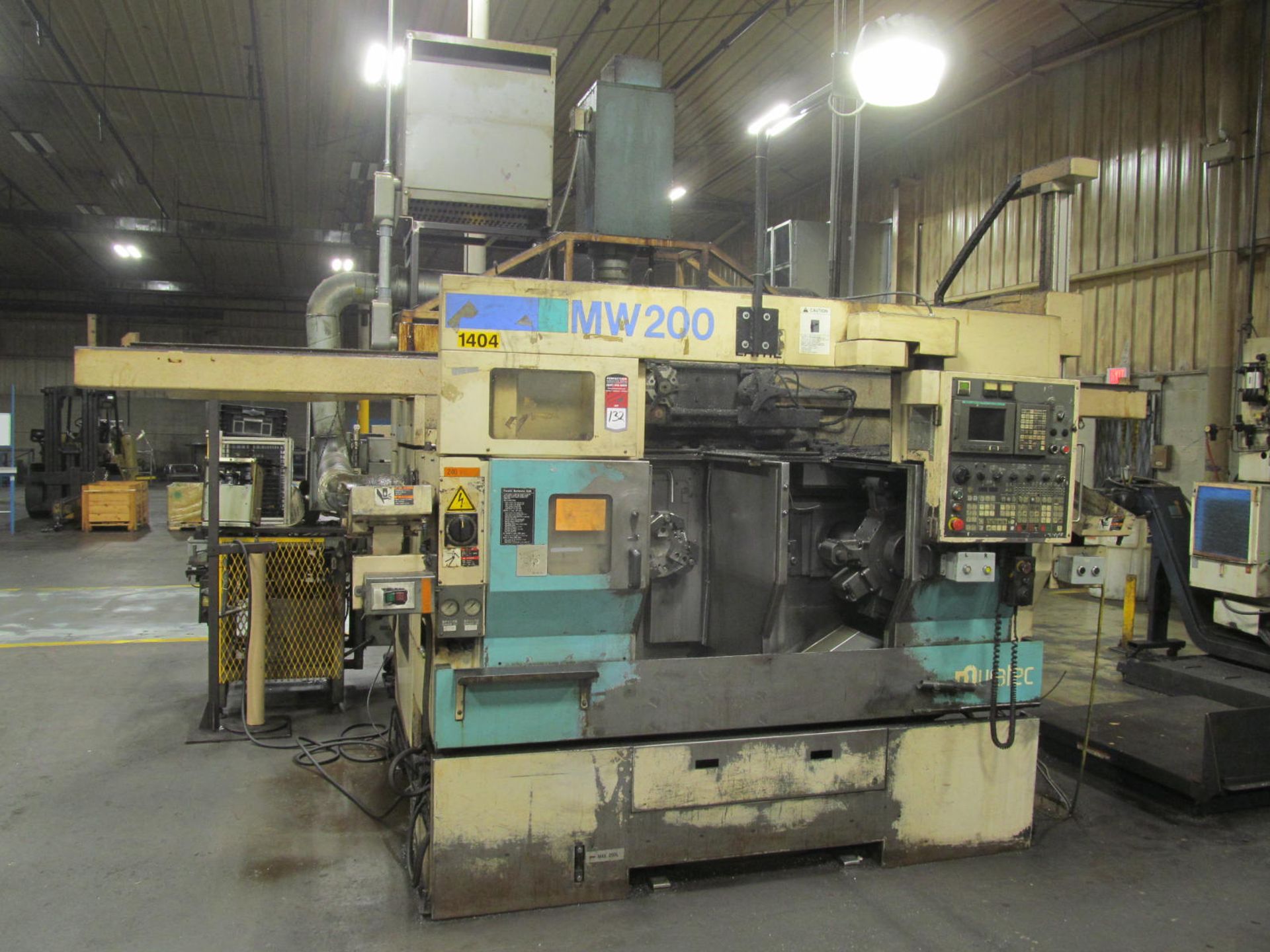 2000 MURATA MW200 MC9-442 4-Axis Turning Center, s/n 9KX9365660, w/ MAYFRAN Chip Conveyor