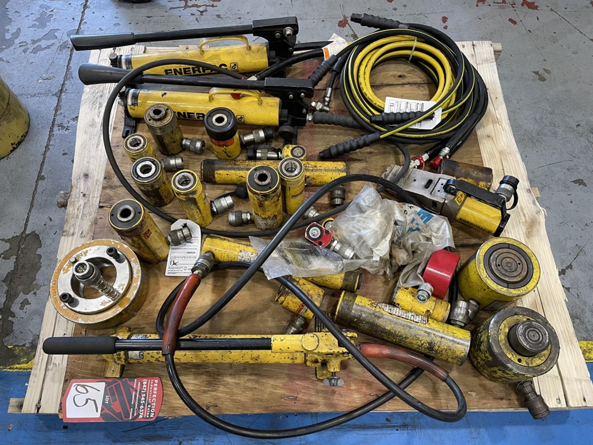 Pallet of Assorted ENERPAC Pumps, Rams, and Hose