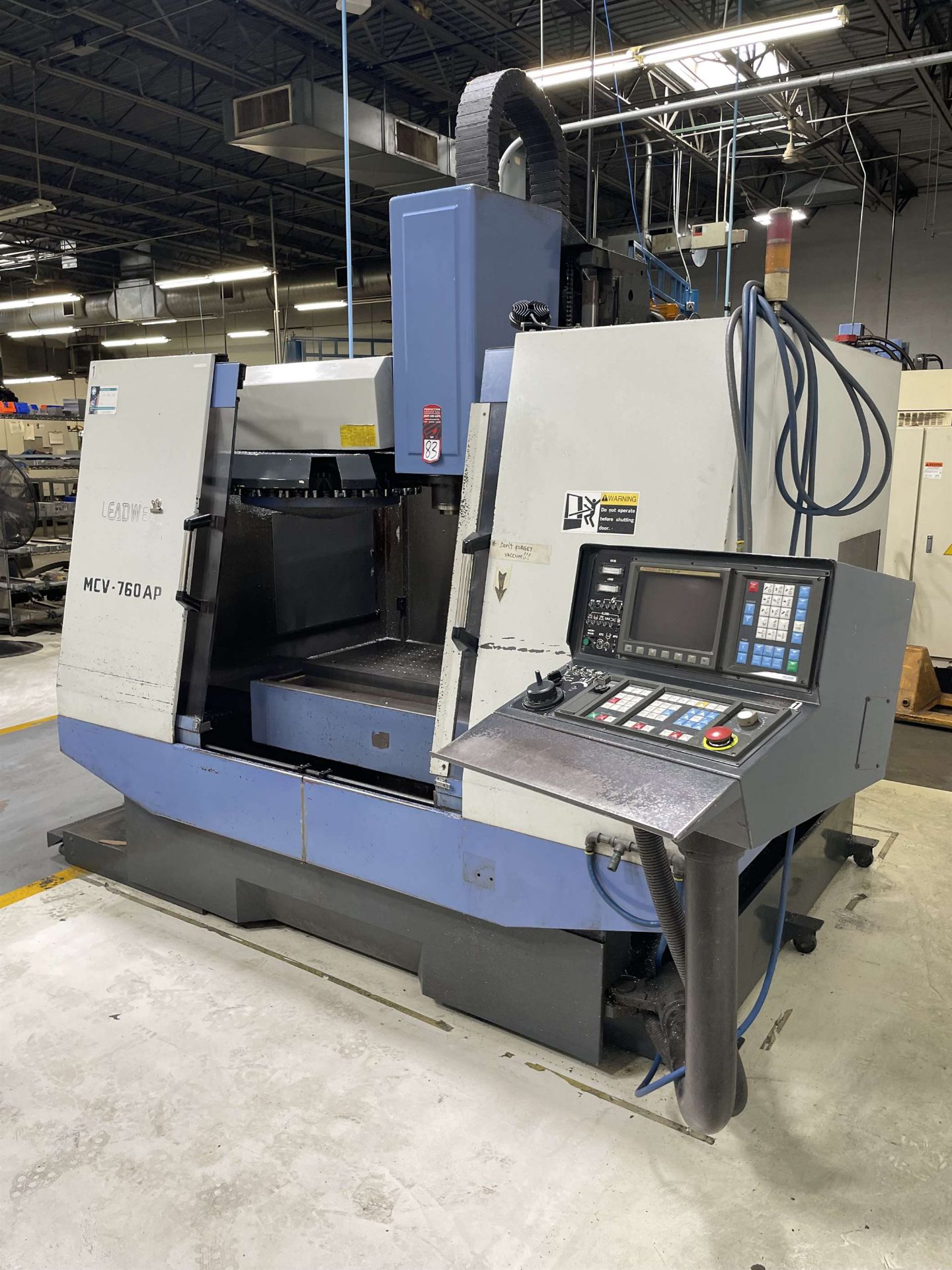 LEADWELL MCV760AP Vertical Machining Center, s/n L1SIE0724, w/ FANUC OMF Control, 20” x 39” Table,