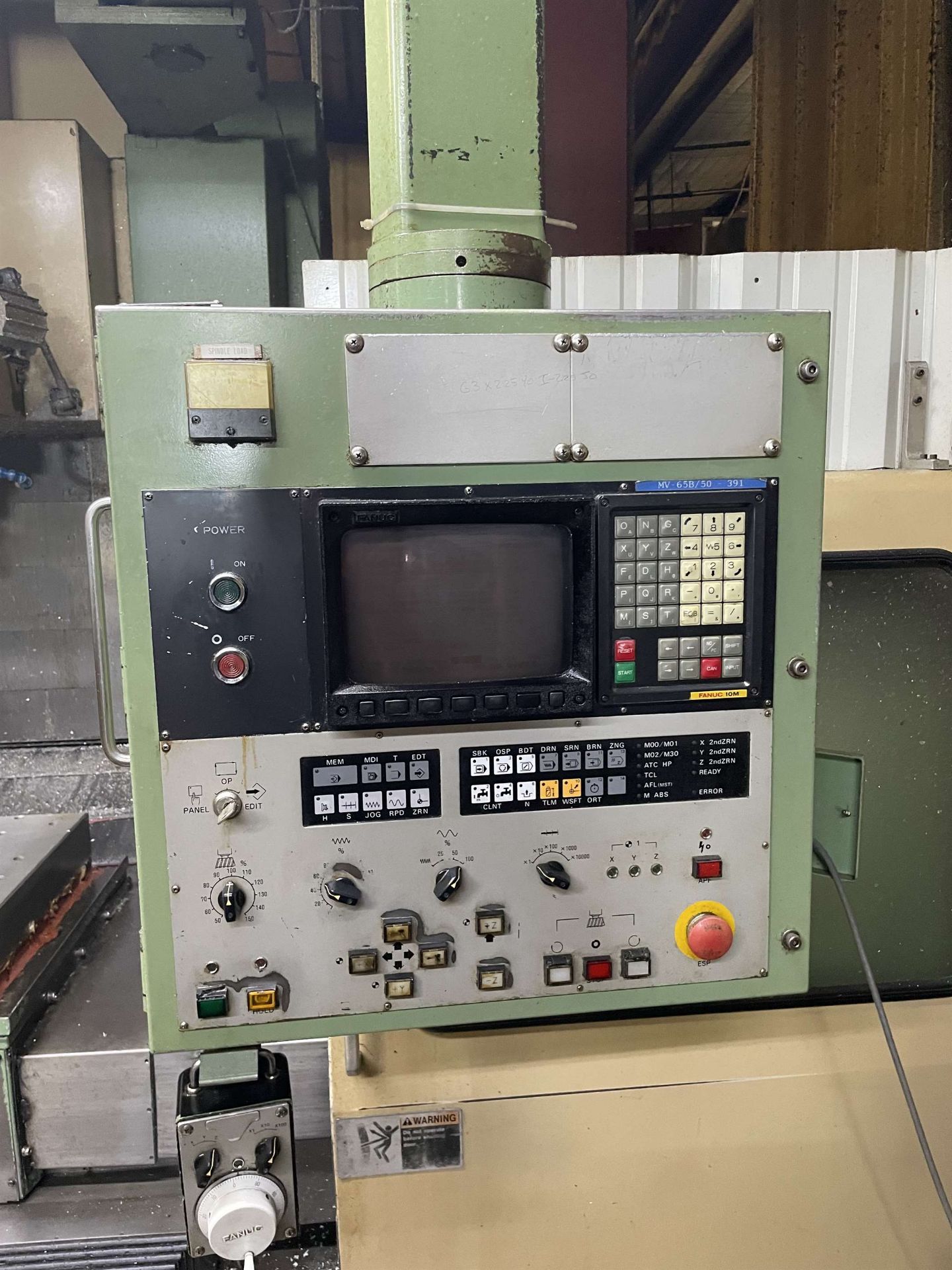 MORI SEIKI MV-65 Vertical Machining Center, s/n 391, w/ FANUC Control, 25” x 67” Table, 50 Taper, 30 - Image 6 of 7