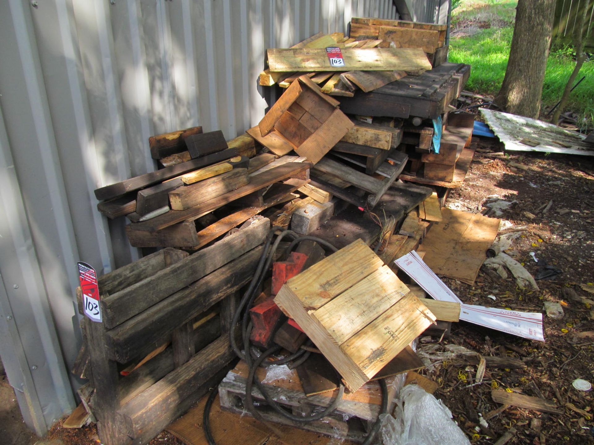 Assorted Wood Behind Building