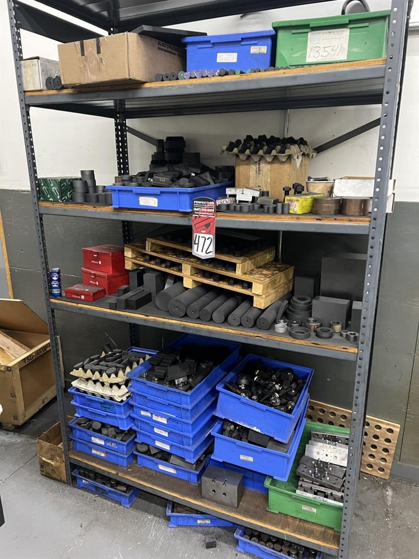 Rack of Assorted EROWA EDM Tooling, Fixtures, and Electrodes