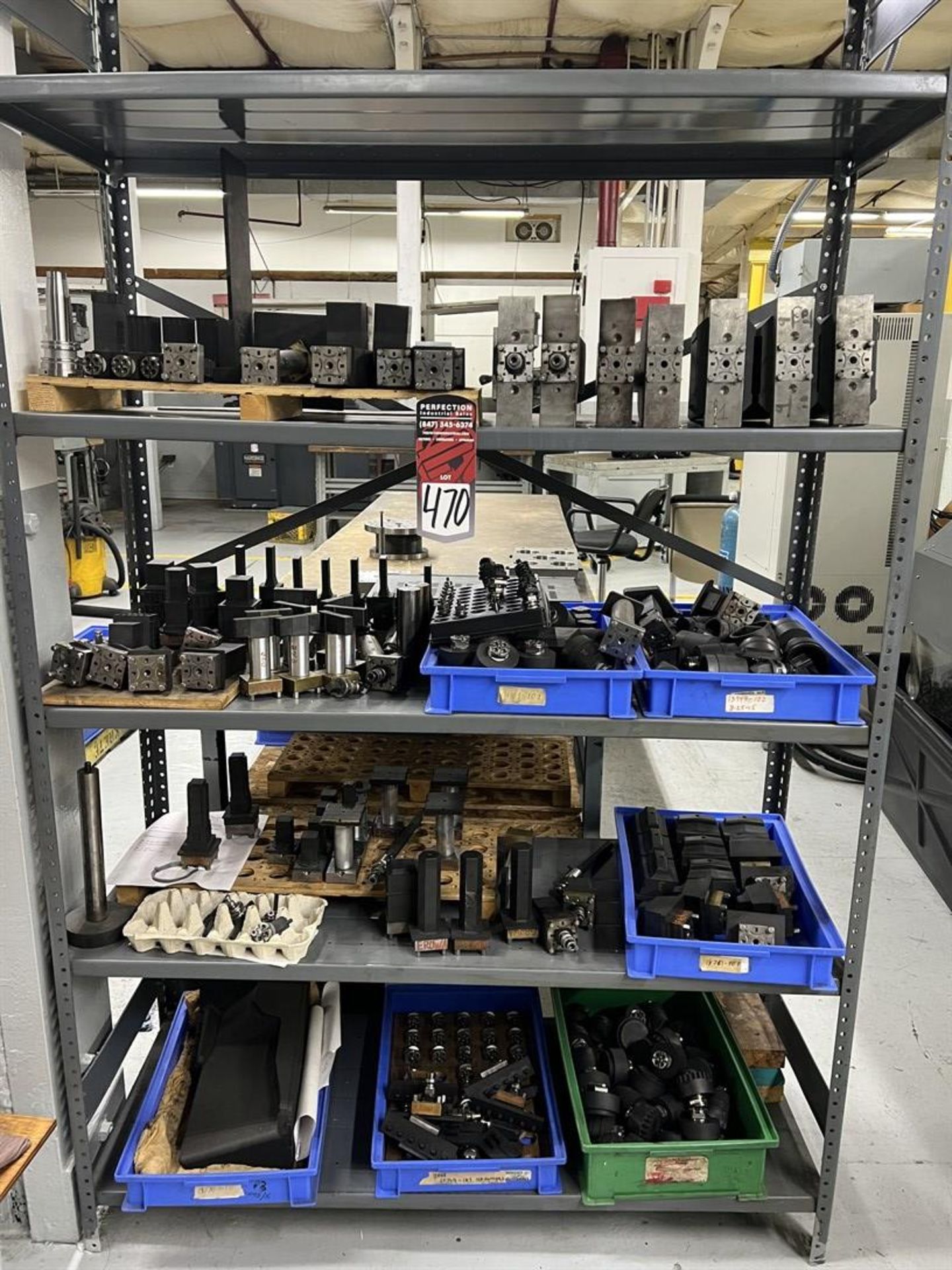 Rack of Assorted EROWA EDM Tooling, Fixtures and Electrodes