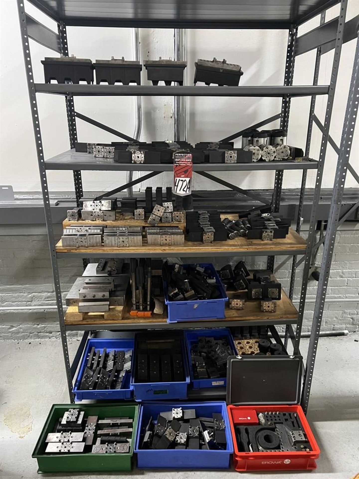 Rack of Assorted EROWA EDM Tooling, Fixtures, and Electrodes