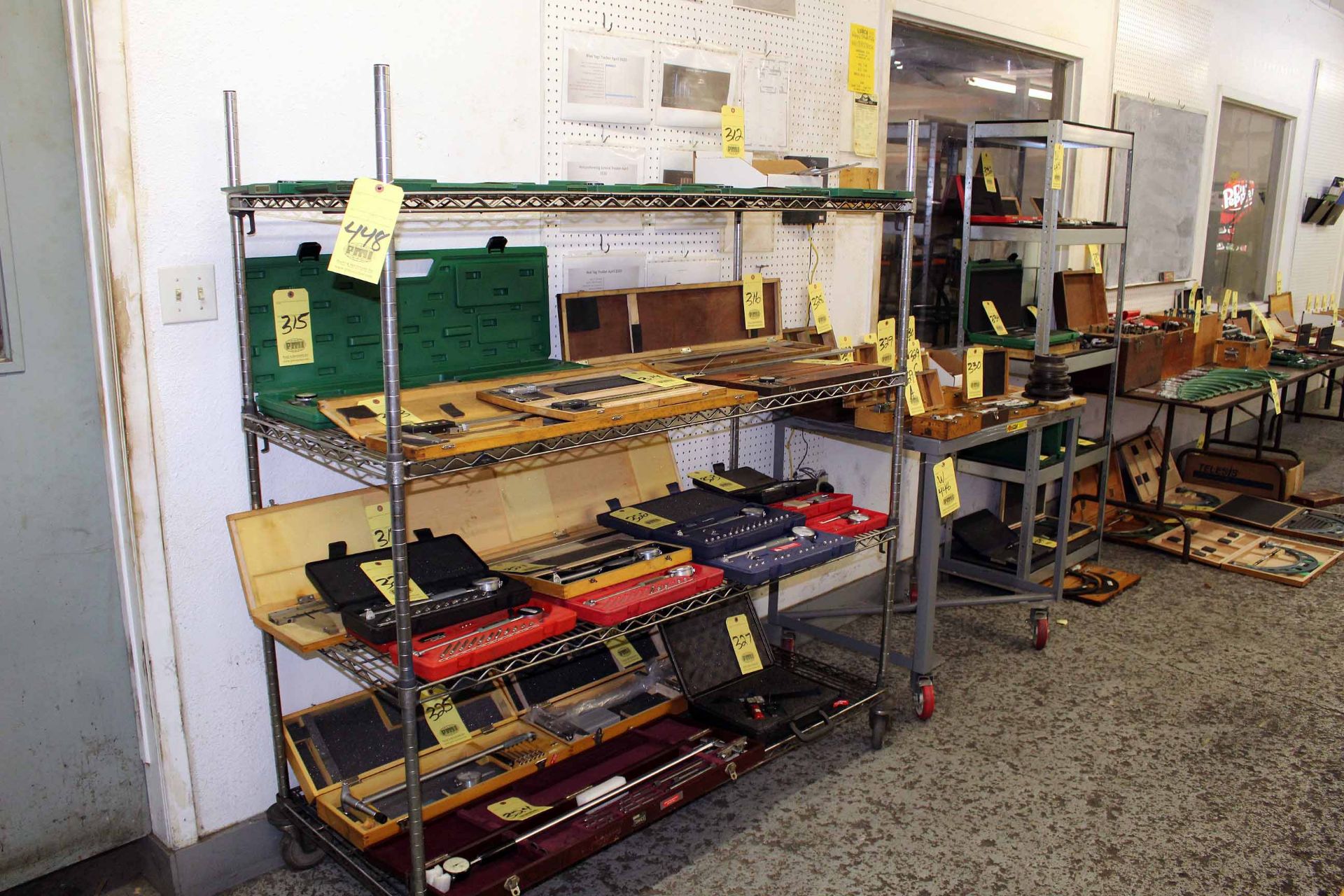 LOT CONSISTING OF: chrome wire rack, roller table, adjustable metal shelves