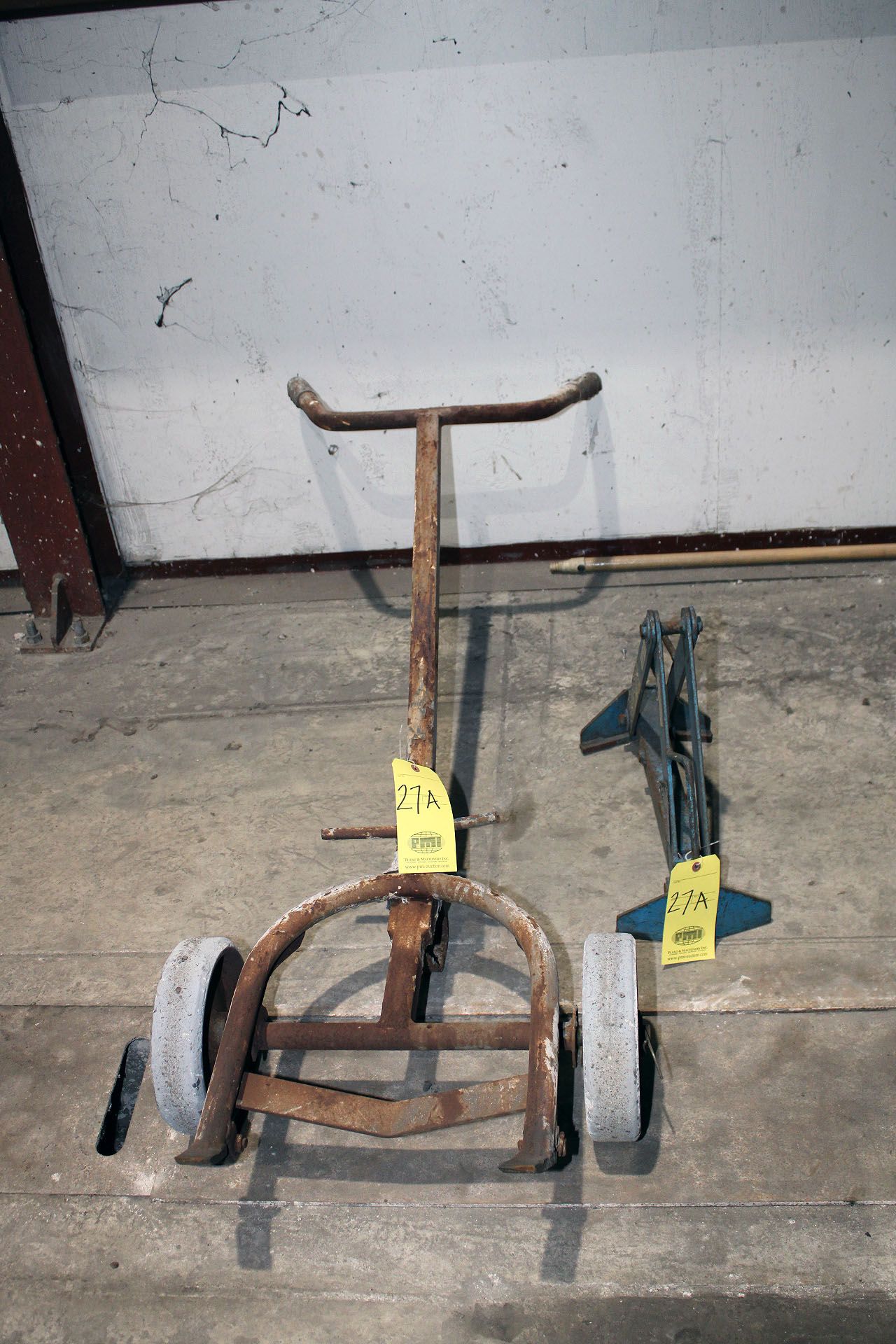 LOT CONSISTING OF: (1) 55 gal. drum dolly & (1) 55 gal. drum lift