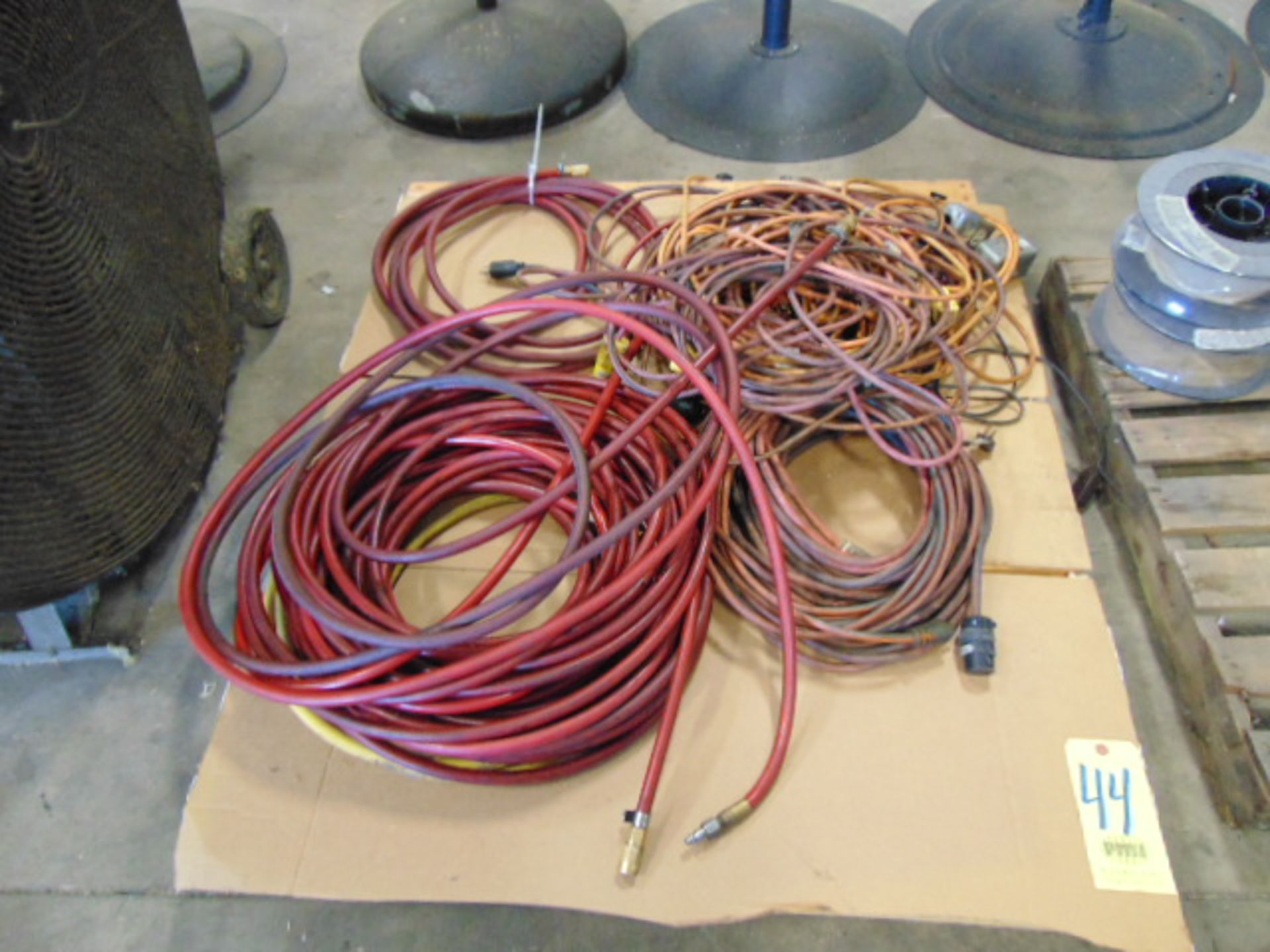 LOT CONSISTING OF: assorted extension cords & air hose (on one pallet)