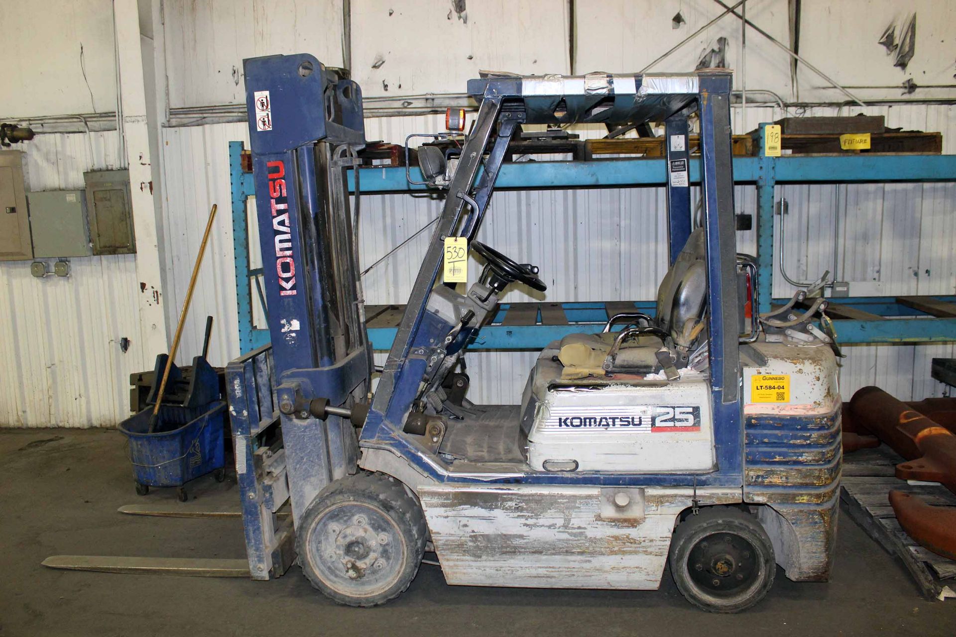 FORKLIFT, KOMATSU, 4,500 lb. cap. @ 24” L.C., LPG gas fuel, 189” max. lift, side shift, load