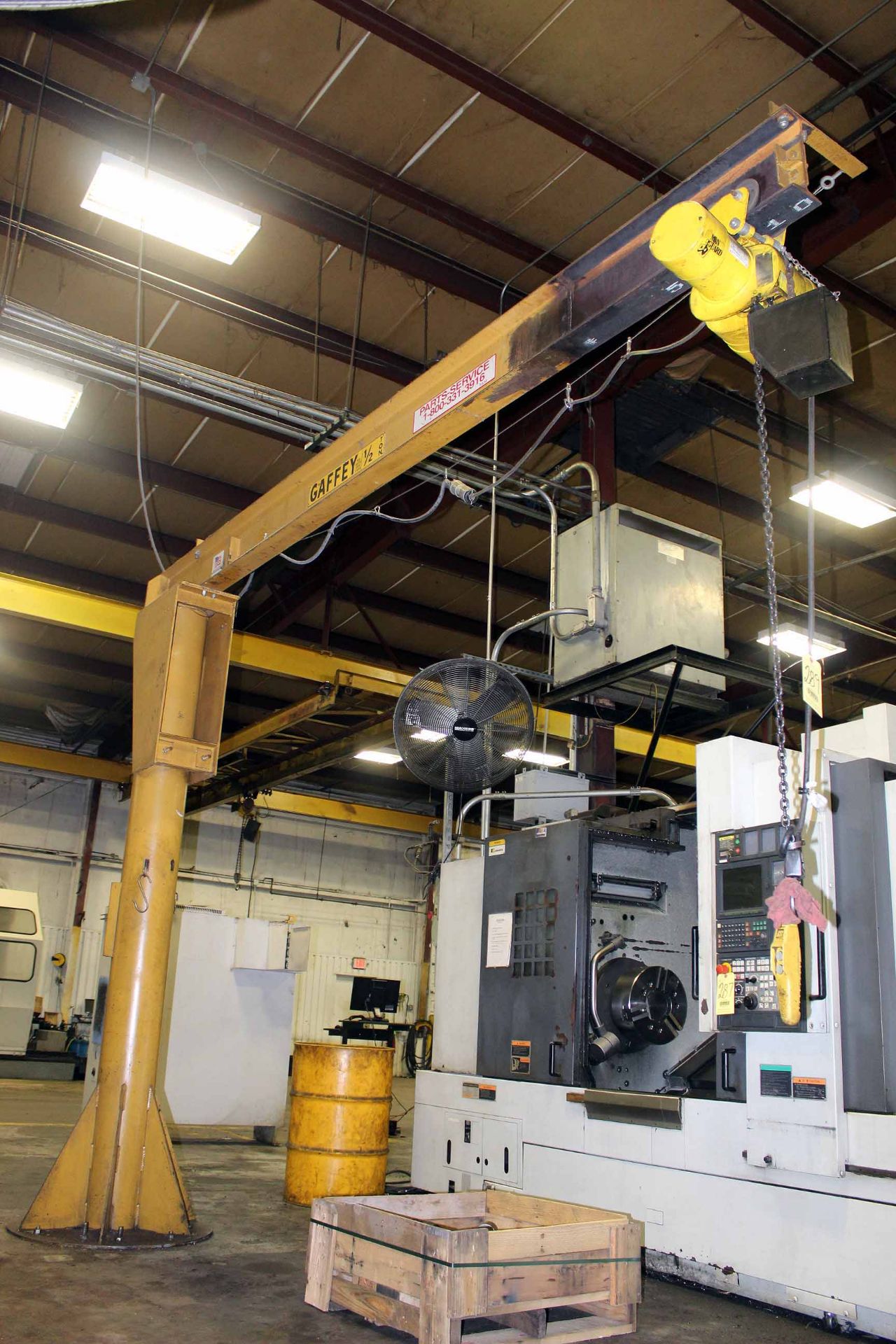 FREE STANDING PEDESTAL JIB CRANE, GAFFEY ½ T. X 11’ REACH, 10’ ht. under rail, Budgit ½ T. cap.