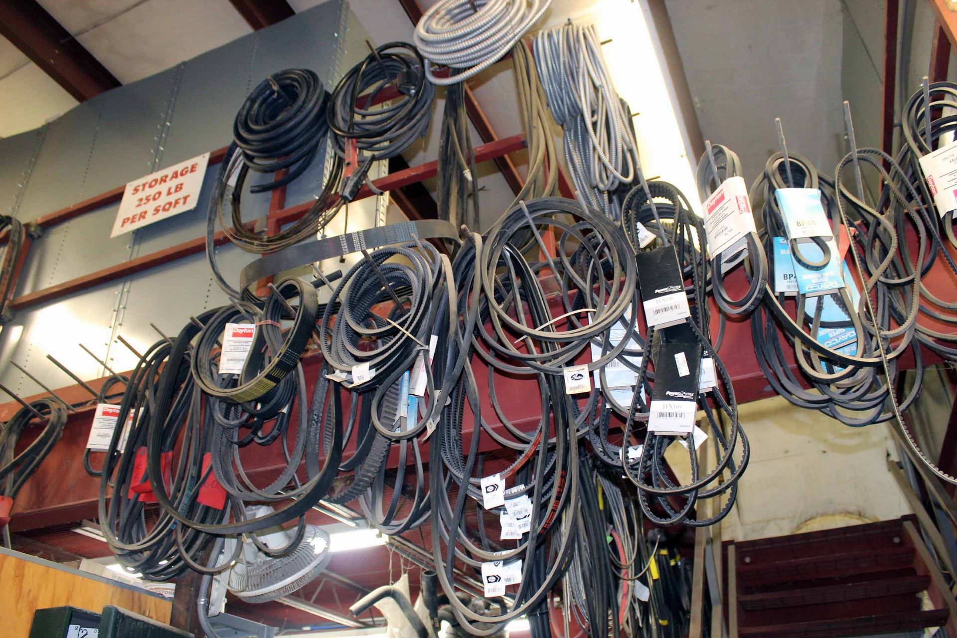 LOT CONTENTS OF HANGING RACK: belts, hoses, etc.