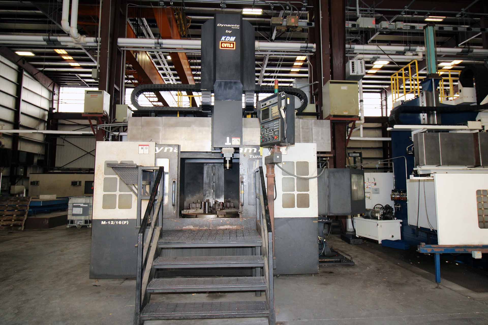 CNC VERTICAL TURNING CENTER, DYNAMIC/KDM MDL. M-12/16/F, new 2009, Fanuc 18i-TB CNC control, 49.2”