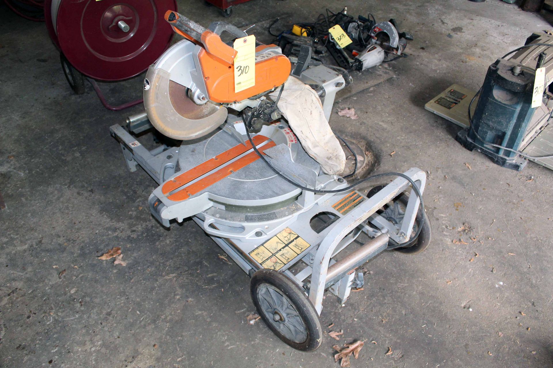 MITER SAW, RIDGID, w/portable stand (Location 9: Unisert Multiwall Systems, 13295 Rocky Road,