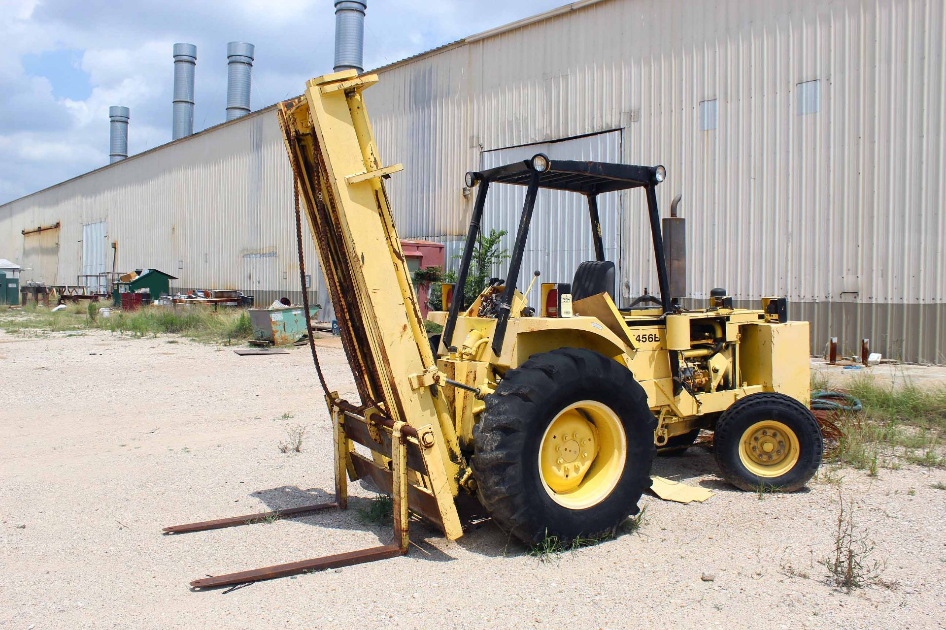 FORKLIFT, HARLO 5,000 LB. BASE CAP. MDL. HF456B, 2-stage mast, rough terrain tires (in need of