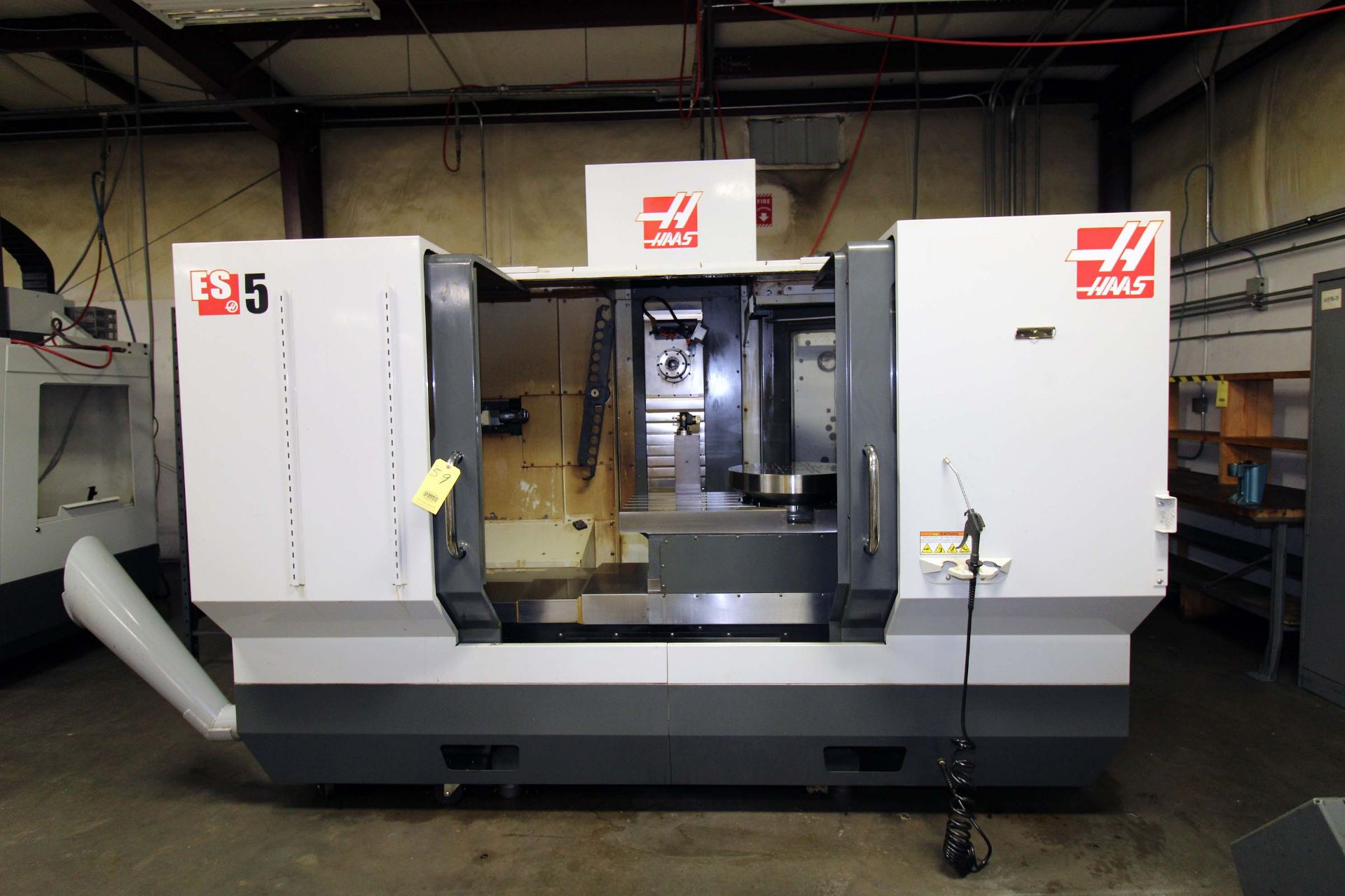 4-AXIS HORIZONTAL MACHINING CENTER, HAAS MDL. ES5-4AX, new 10/2011, 20” x 52” fixed table w/12”
