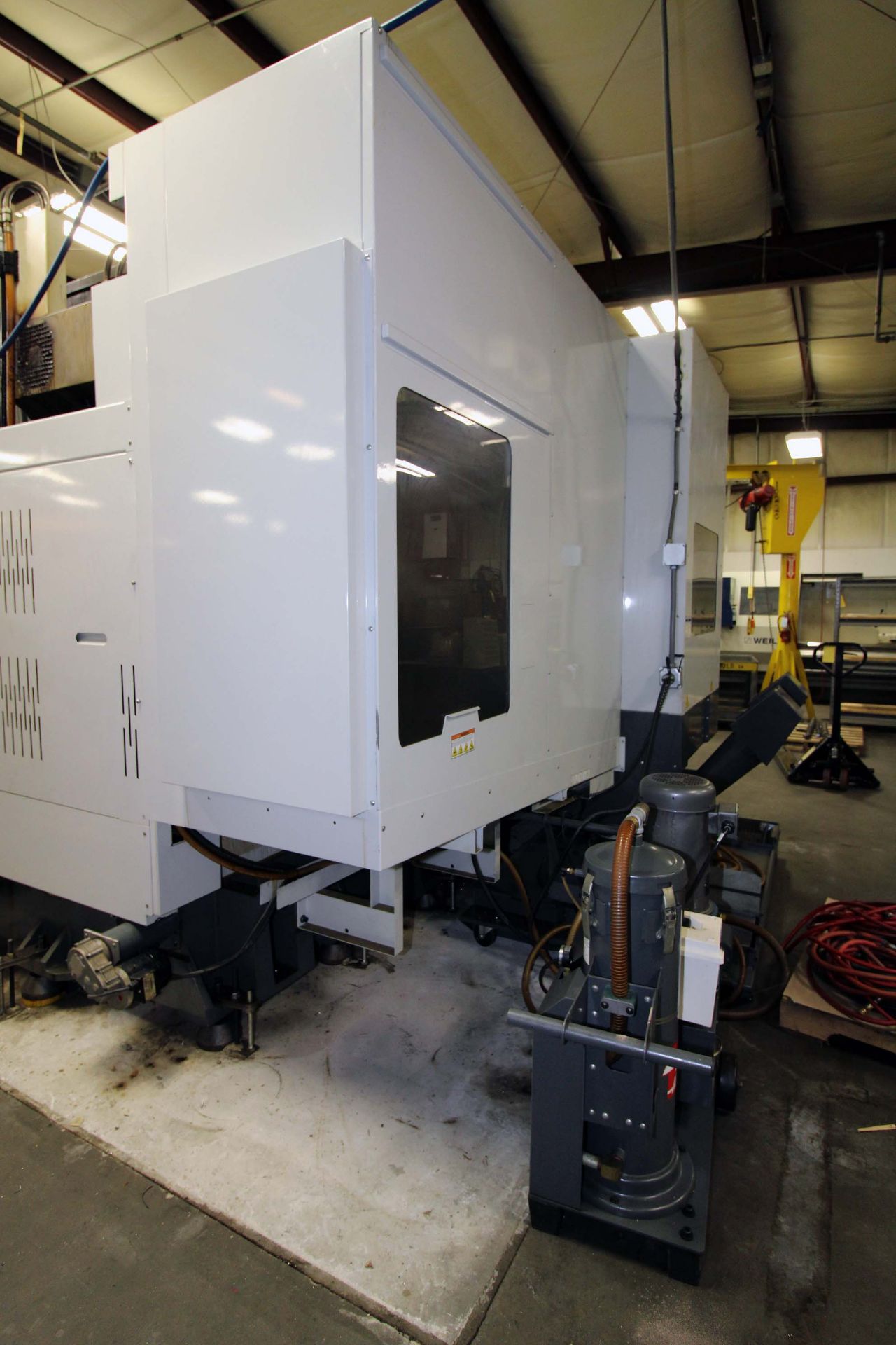 4-AXIS HORIZONTAL MACHINING CENTER, HAAS MDL. EC1600, new 6/2012, 64” x 36” table, 30” built-in - Image 12 of 15