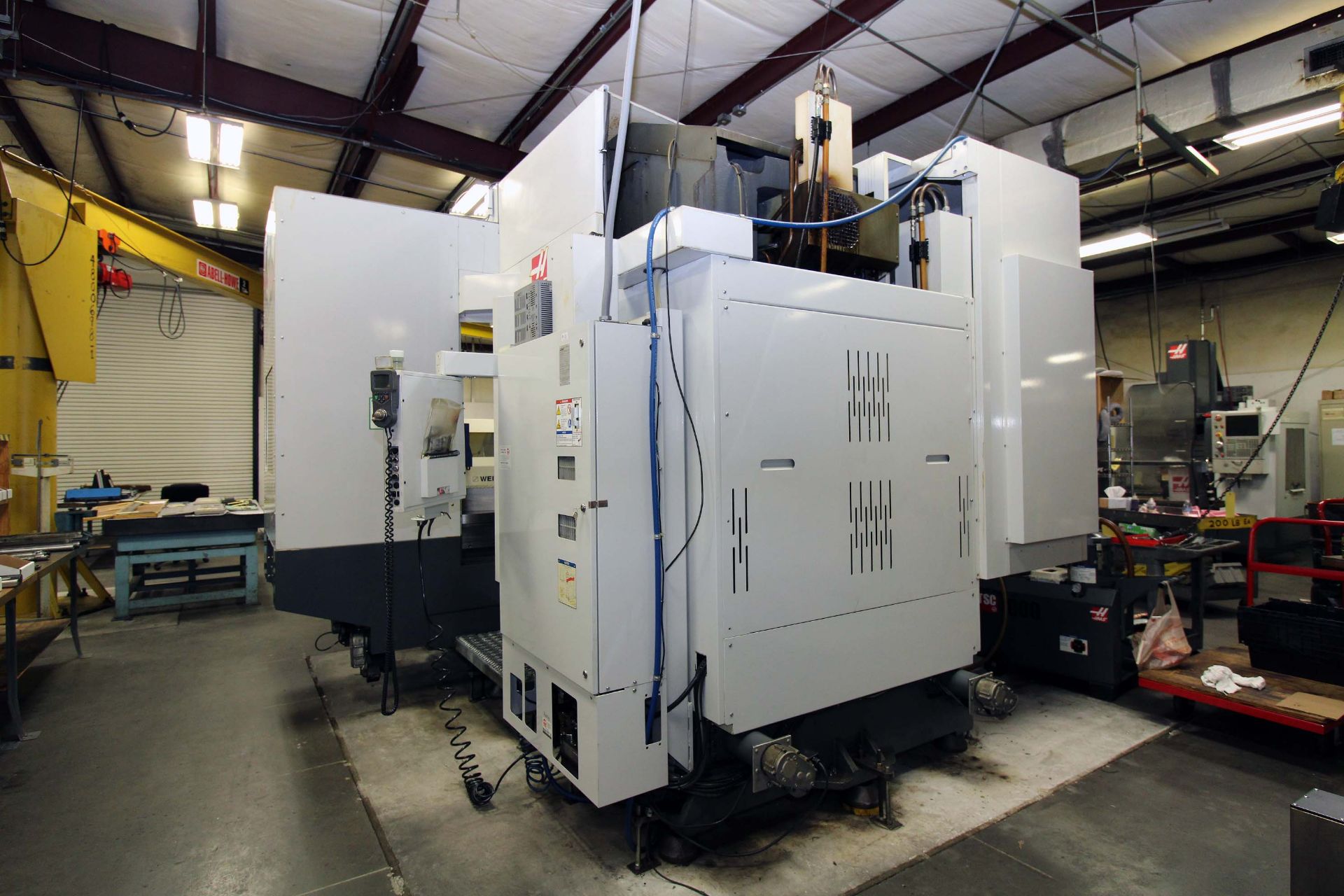 4-AXIS HORIZONTAL MACHINING CENTER, HAAS MDL. EC1600, new 6/2012, 64” x 36” table, 30” built-in - Image 11 of 15