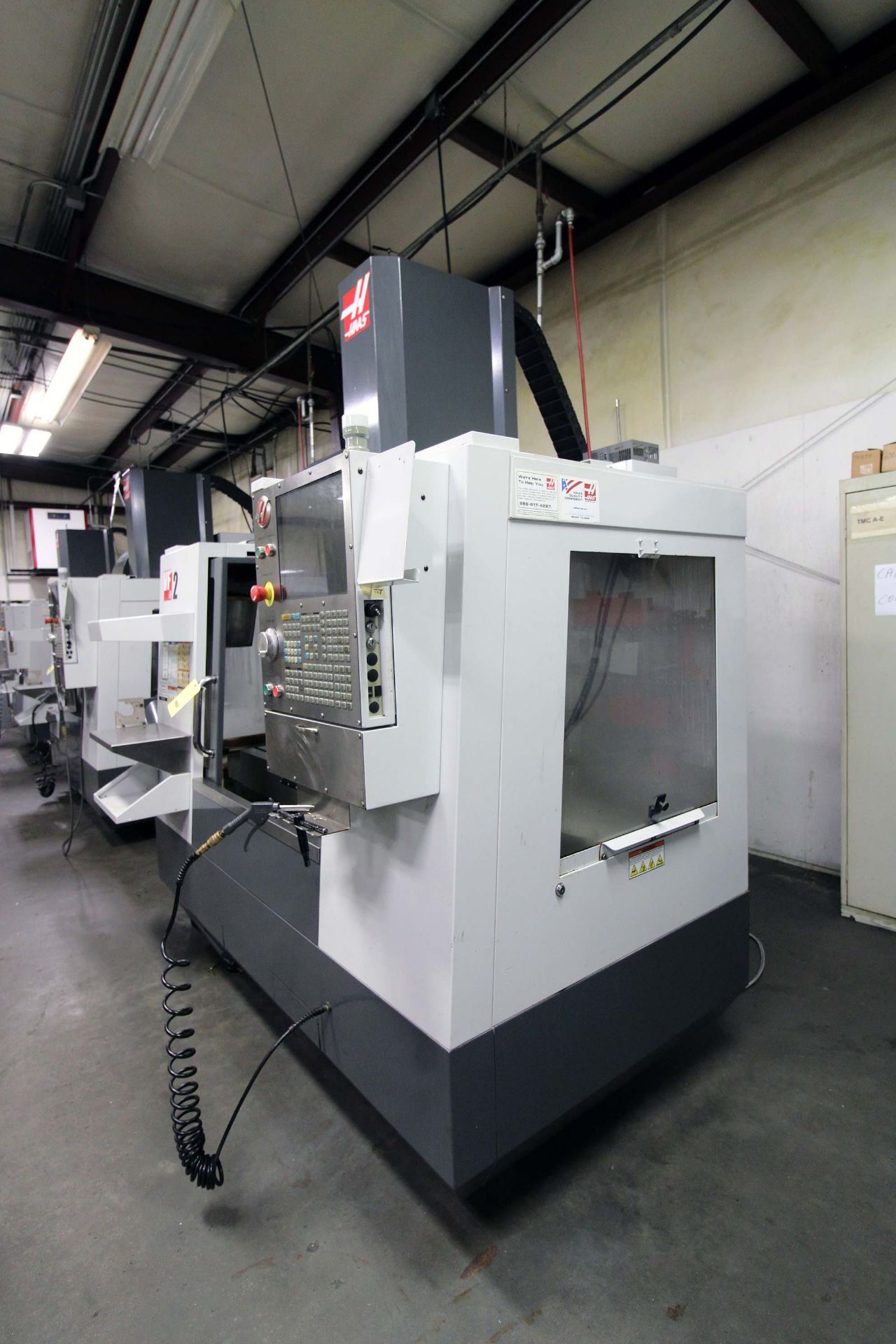 4-AXIS VERTICAL MACHINING CENTER, HAAS MDL. VF2, new 9/2011, 36” x 14” table, 30” X, 16” Y, 20” Z- - Image 2 of 10