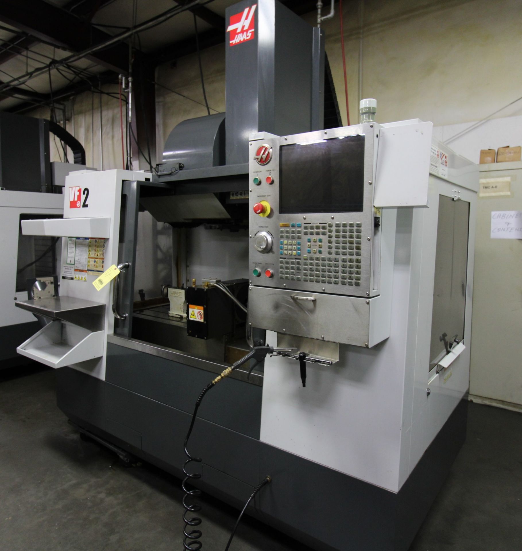 4-AXIS VERTICAL MACHINING CENTER, HAAS MDL. VF2, new 9/2011, 36” x 14” table, 30” X, 16” Y, 20” Z-