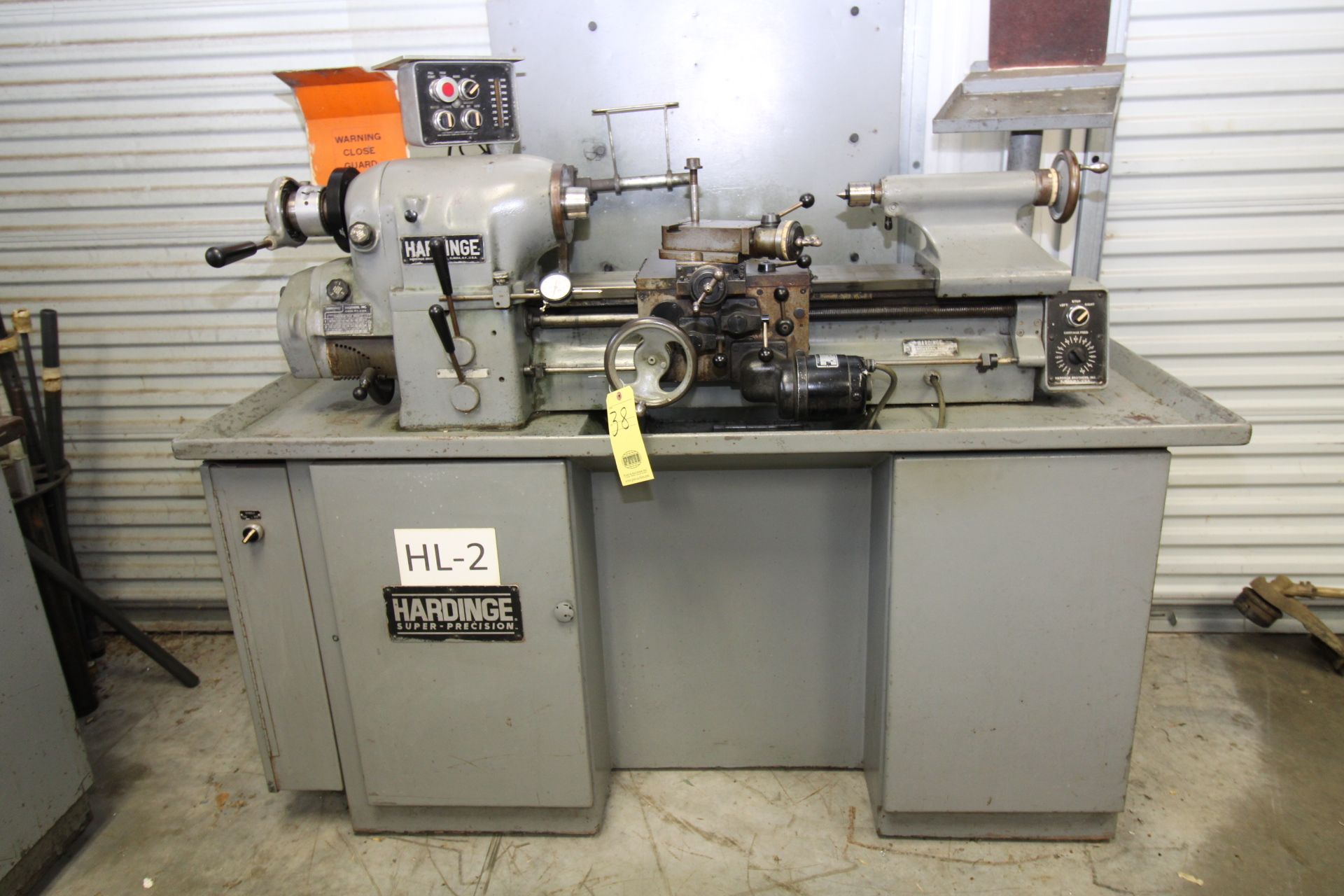 PRECISION TOOLROOM LATHE, HARDINGE MDL. HLVH, 10” swing, 20” dist. btwn. centers, cabinet base,