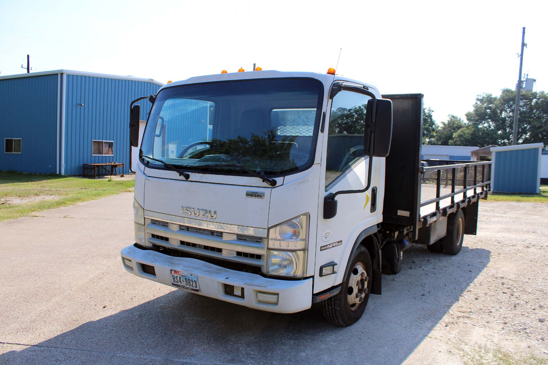 FLATBED TRUCK, 2012 ISUZU MDL. NPR-HD SUPER DUTY CAB OVER, auto. trans., 15-1/2’ diamond plate bed