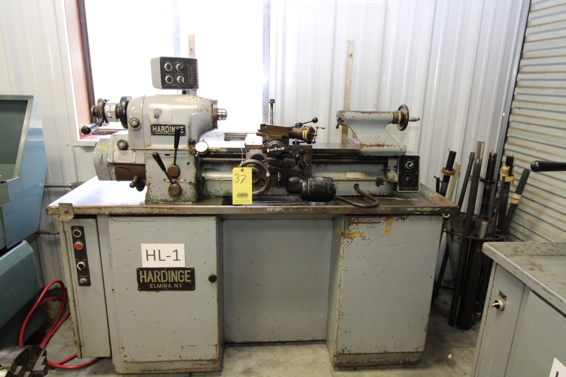 PRECISION TOOLROOM LATHE, HARDINGE MDL. HLVH, 10” swing, 20” dist. btwn. centers, cabinet base,