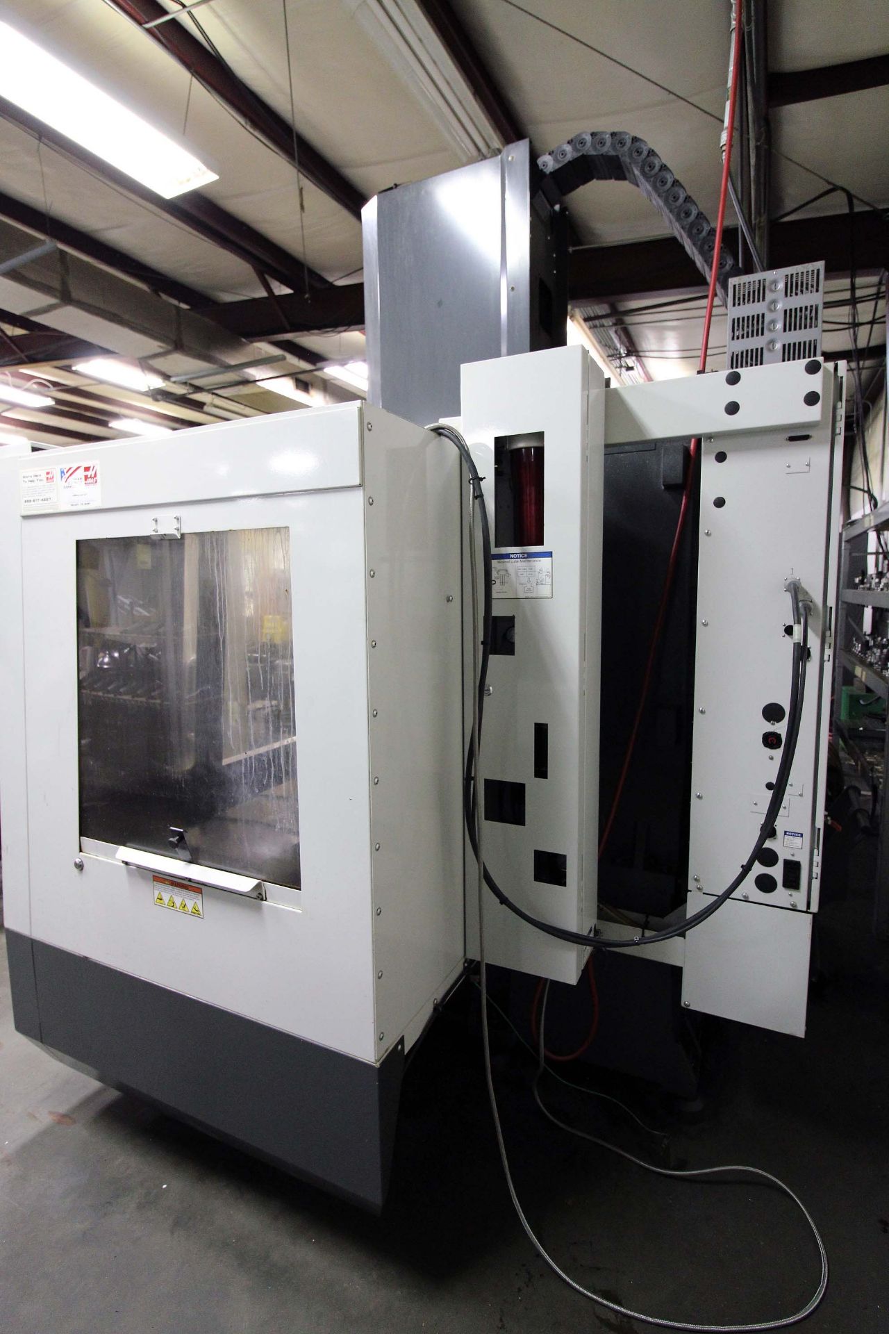 4-AXIS VERTICAL MACHINING CENTER, HAAS MDL. VF2, new 9/2011, 36” x 14” table, 30” X, 16” Y, 20” Z- - Image 3 of 10
