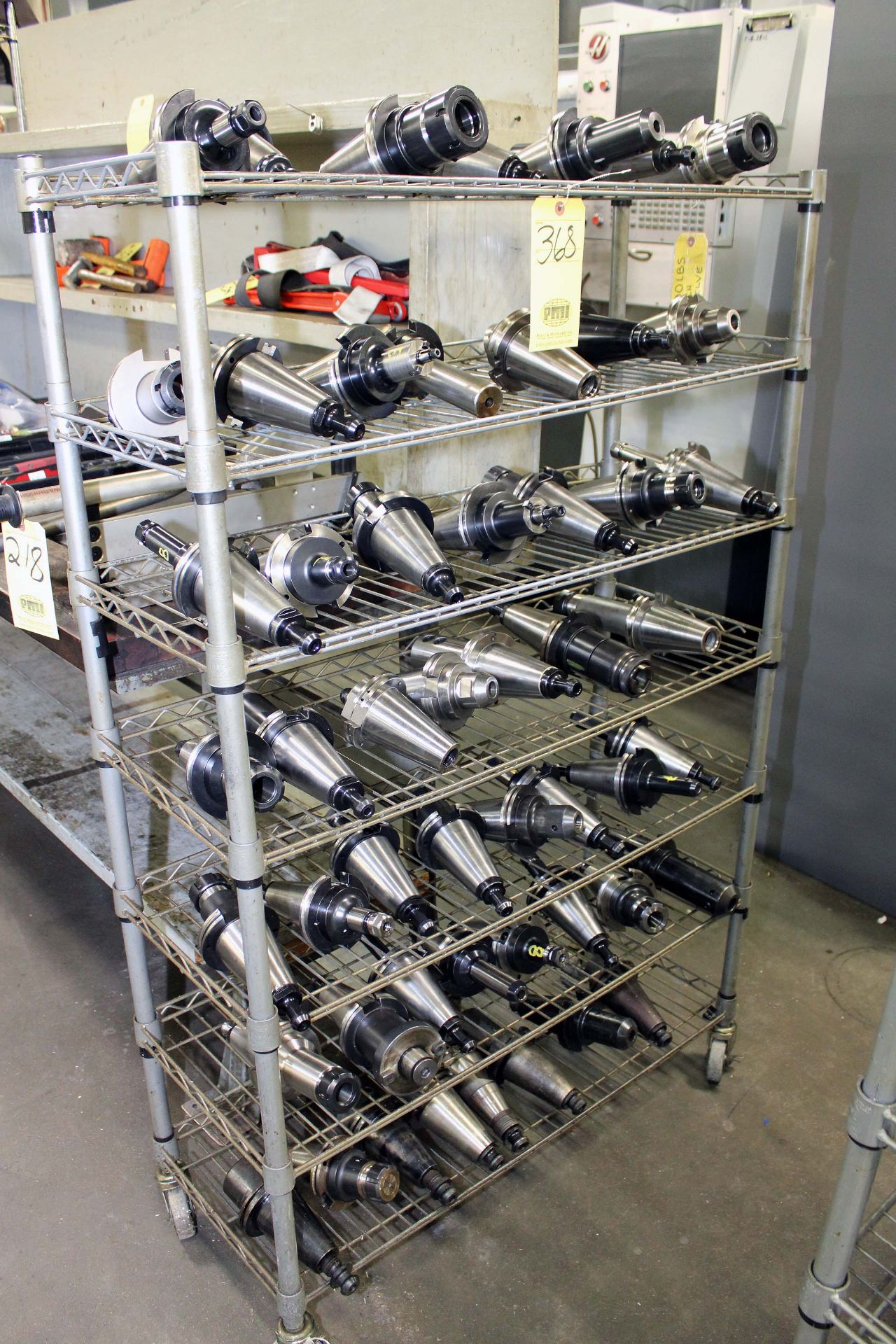 LOT CONSISTING OF: CAT-50 toolholders & rolling metal shelf (approx. 50 tools)