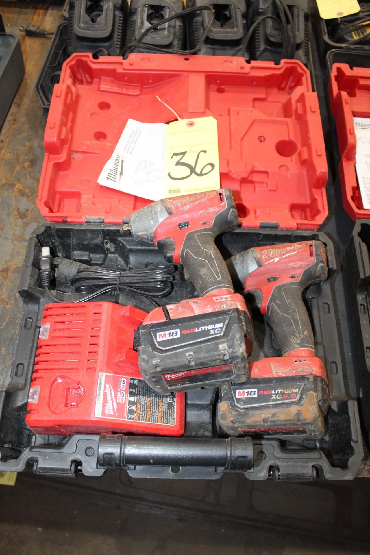 CORDLESS IMPACT DRIVER, MILWAUKEE M18, battery pwrd., red lithium XC 5.0, w/charger & (2) batteries