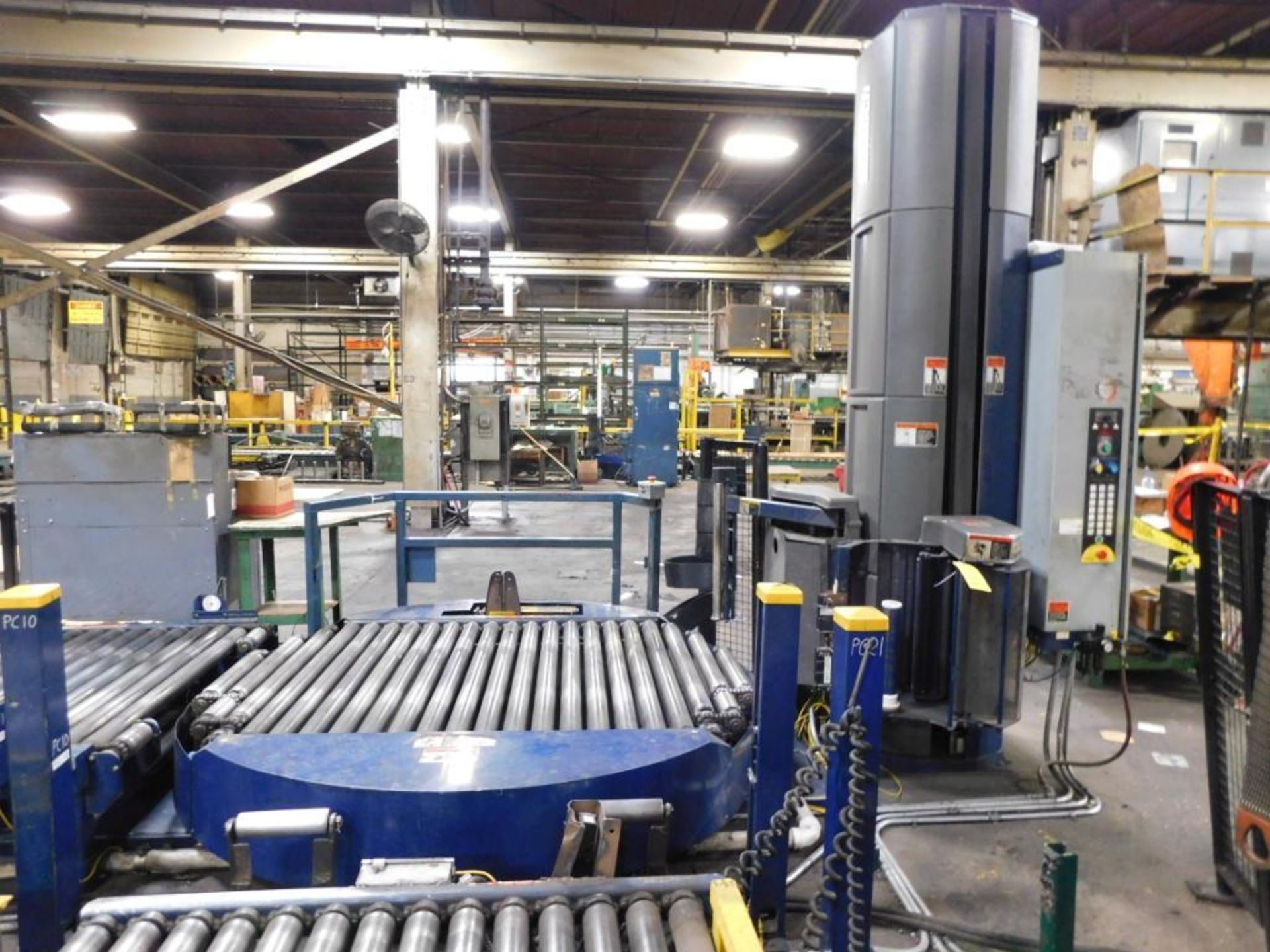 LOT: Lantech 60 in. High x 60 in. Dia. Power Roller Bed Rotary Pallet Wrapper, with Assorted Power