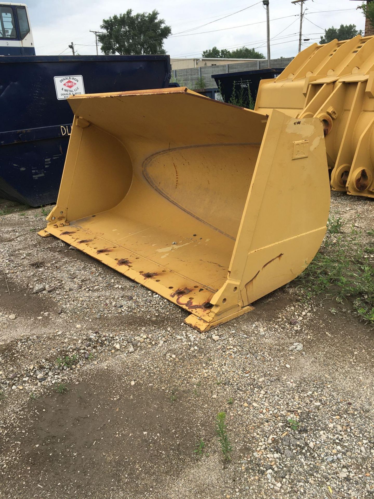 Caterpillar General Purpose Bucket, 120 in. (est.) W, 8 Teeth. (Mounting Brackets Damaged)