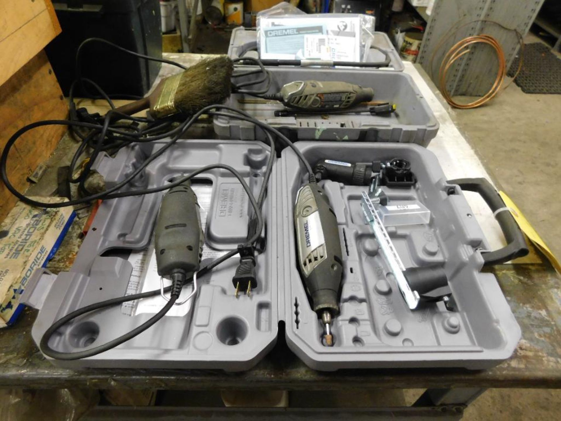 LOT: (3) Dremel Tools with Accessories & Work Bench (LOCATION: 520 DRESDEN ST., KALKASKA, MI 49646)