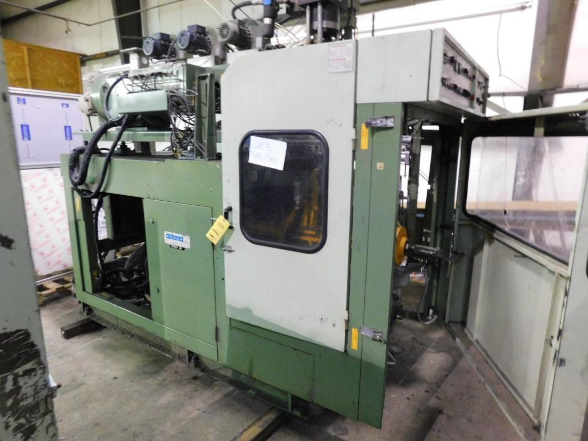 LOT: Line #2- Automa Single-Station Shuttle Continuous Extrusion 3L Blow Molding Machine Model Speed