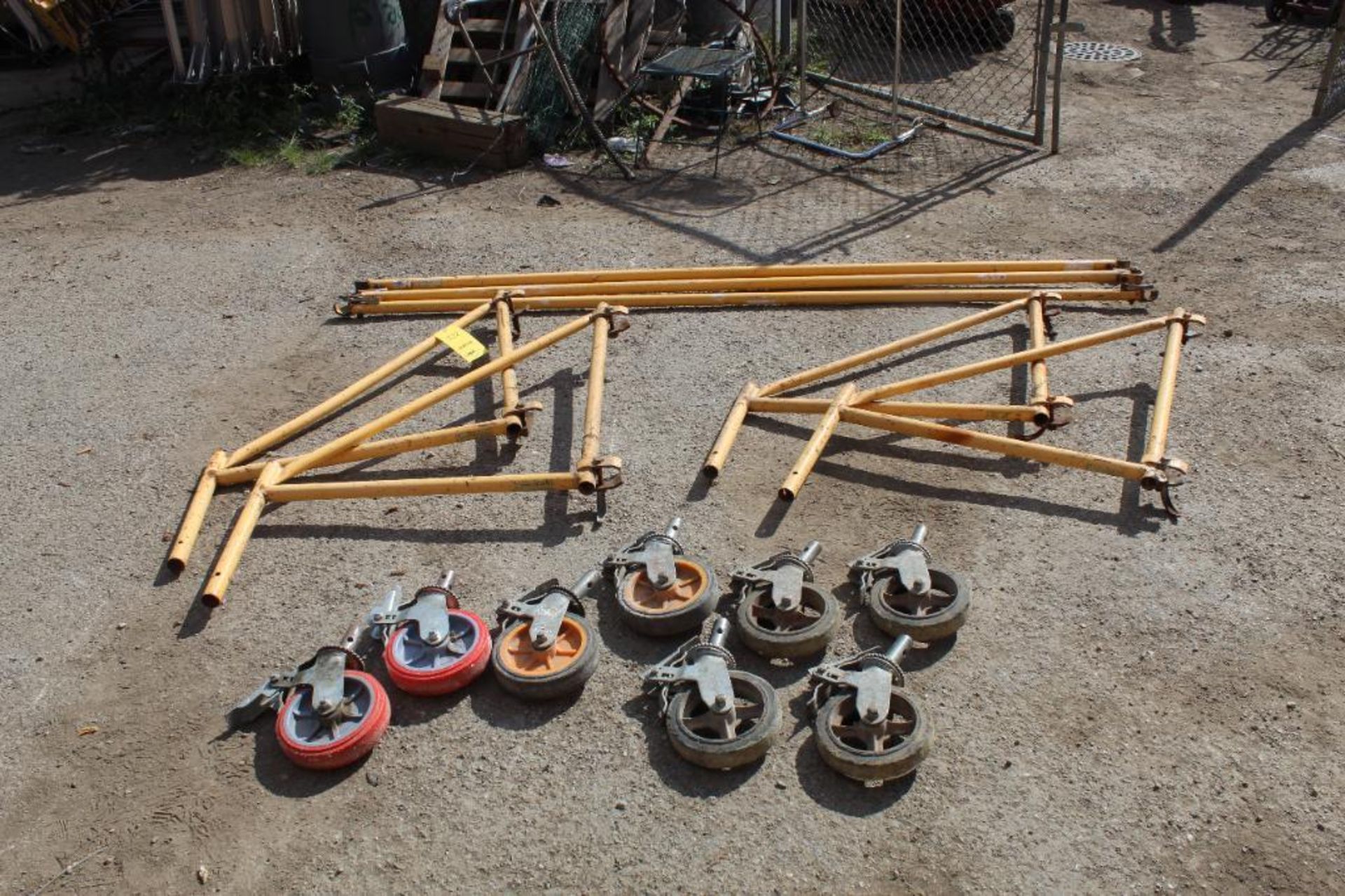 LOT: (4) Scaffold Out Riggers, (3) Center Braces, (8) Casters