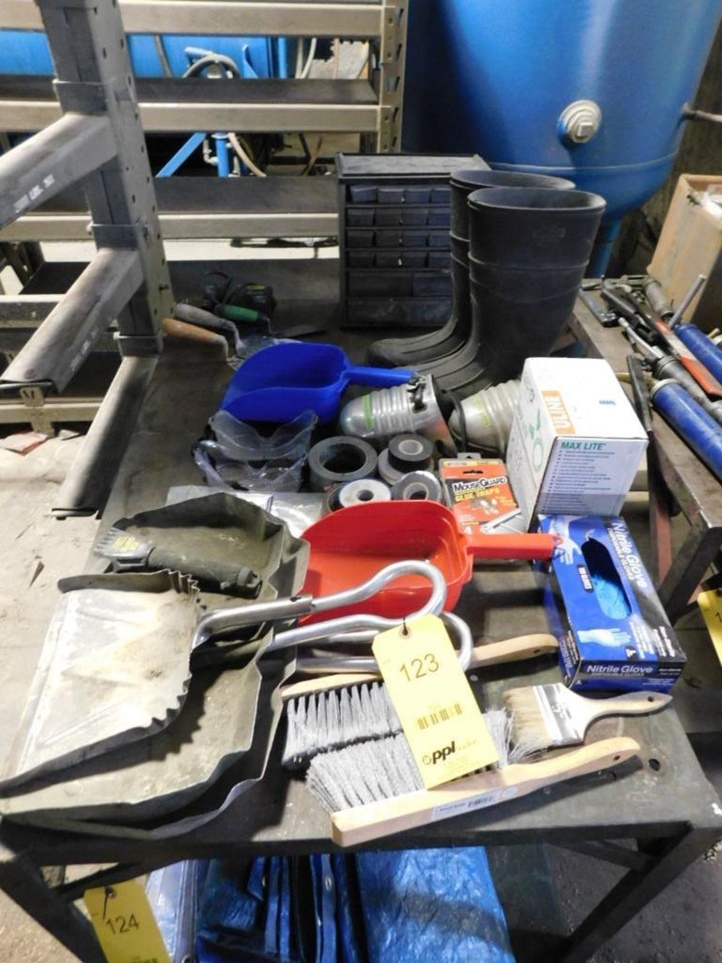 LOT: Contents of Cart including Assorted Tapes, Boots, Tarps, Goggles, Gloves, Pump, Dust Pans, Brus