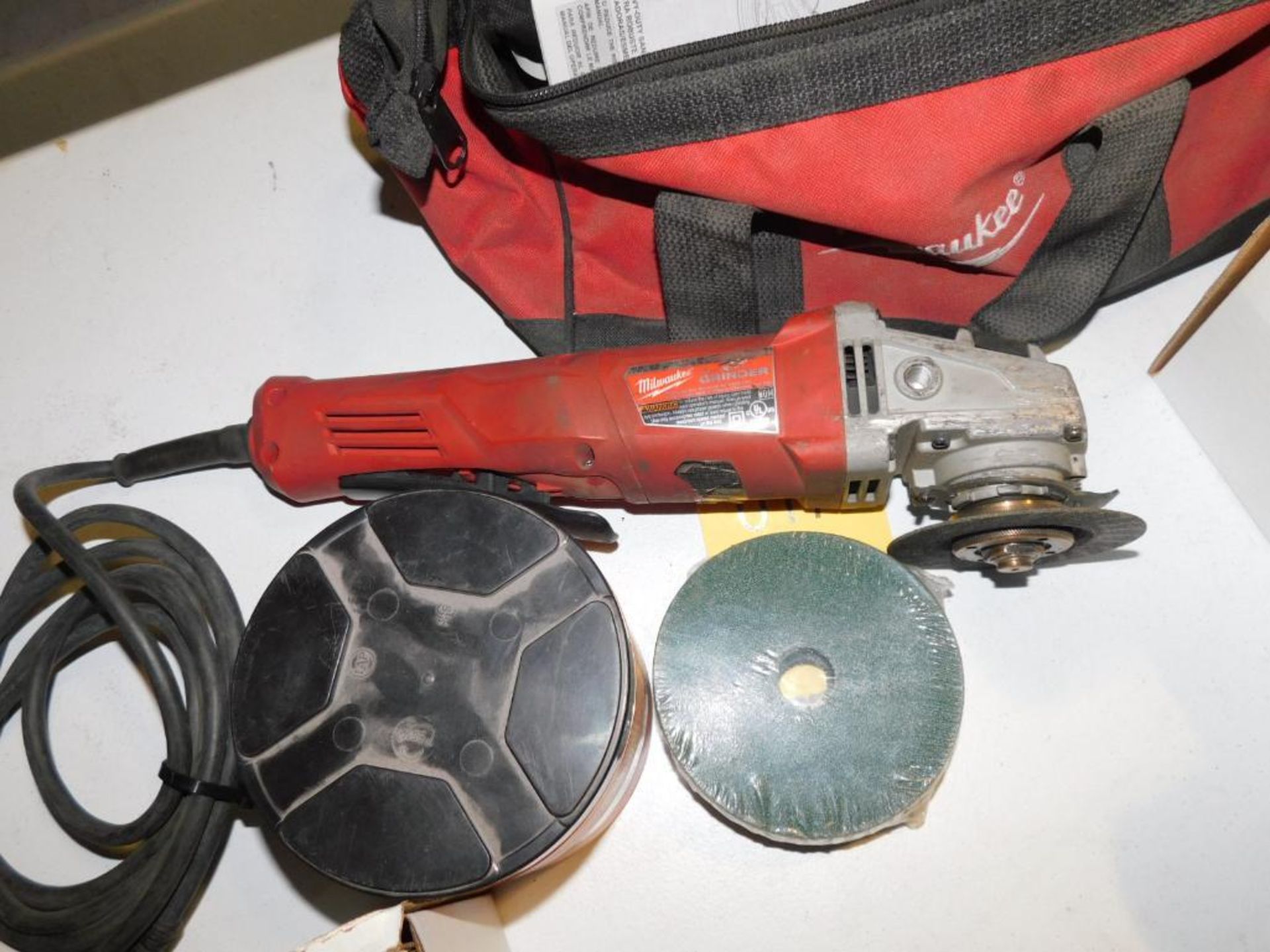 LOT: Milwaukee 4-1/2 in. Angle Grinder, with Bag & Cutting Discs - Image 2 of 2