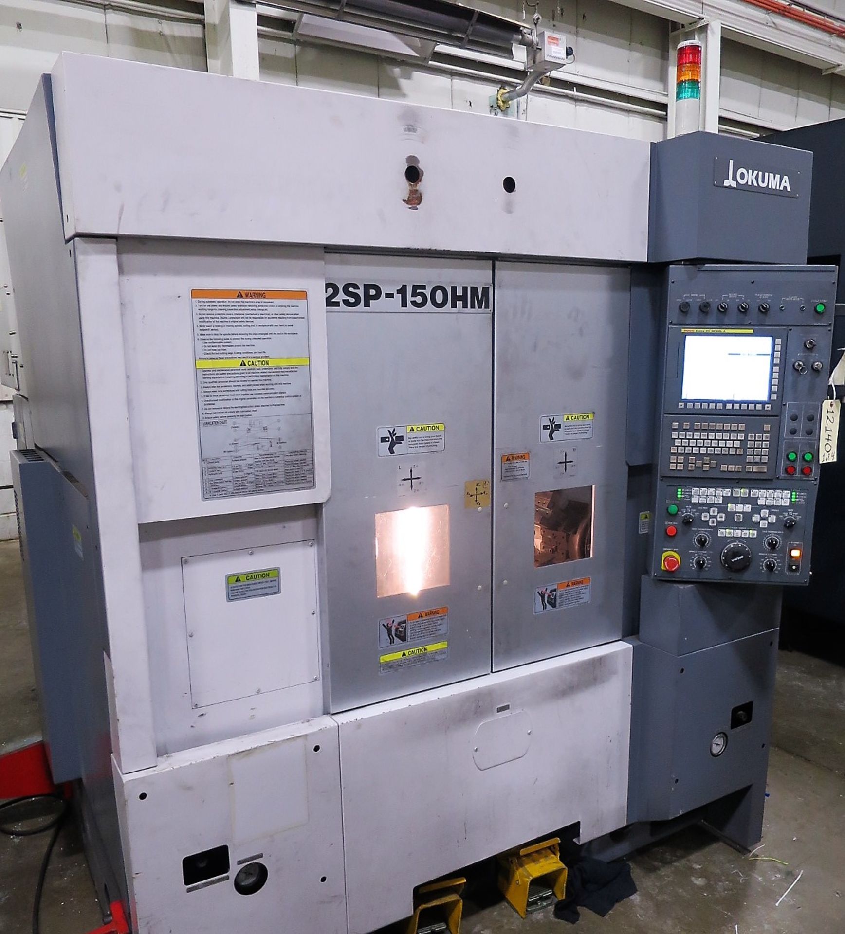 Okuma 2SP-150HM Twin Spindle 3-Axis Turning Center w/Live Milling, S/N 2SP-150HM, New 2011
