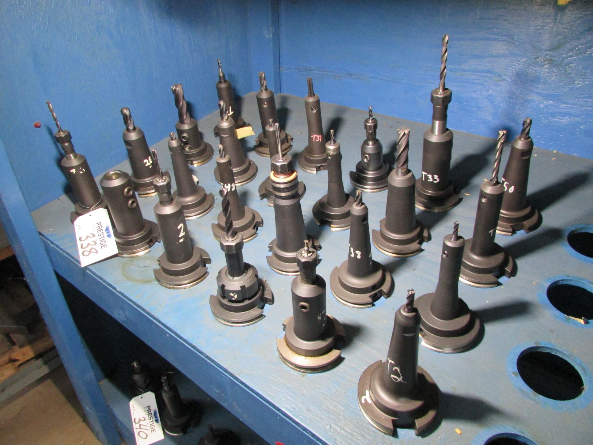(24) Assorted CAT 50 Taper Tool Holders with Misc. Tooling