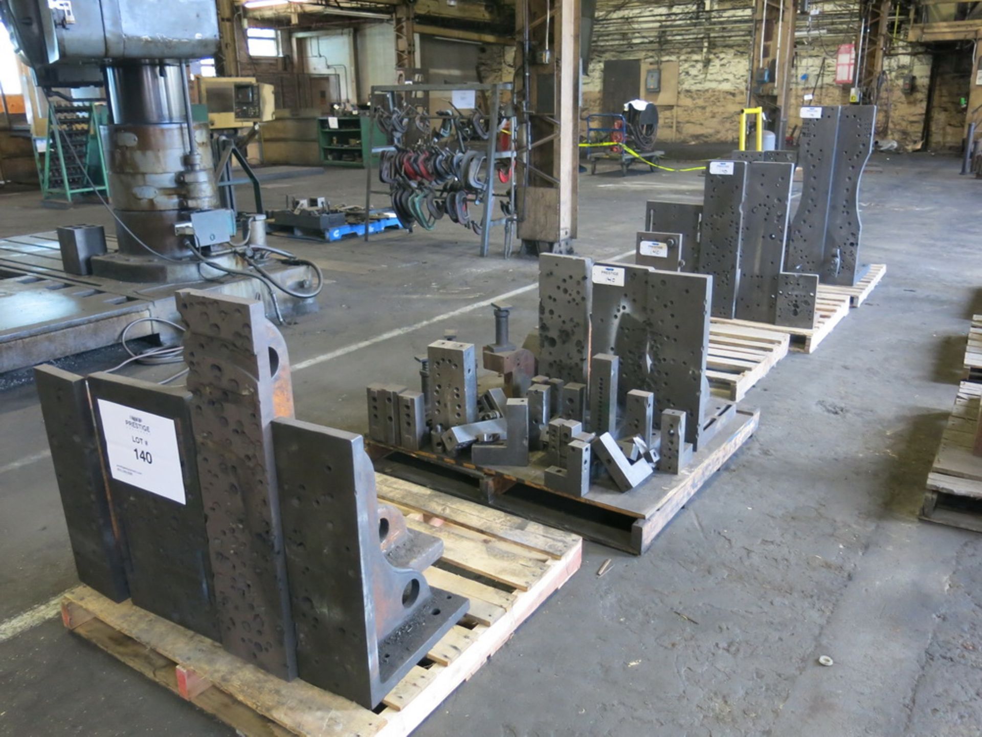 (5) Pallets of Angle Plates & Material Risers