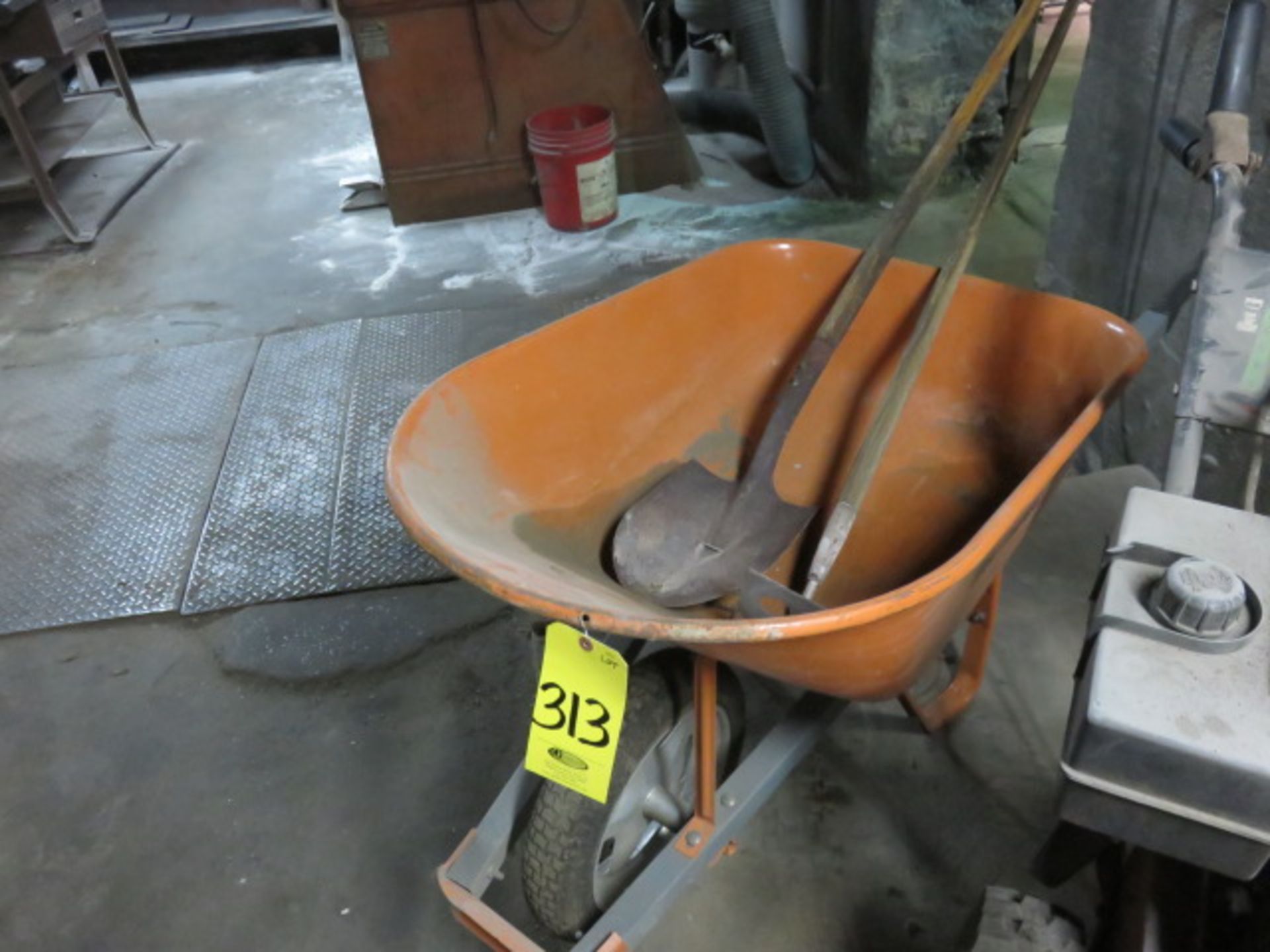 WHEELBARROW WITH HOE AND SHOVEL