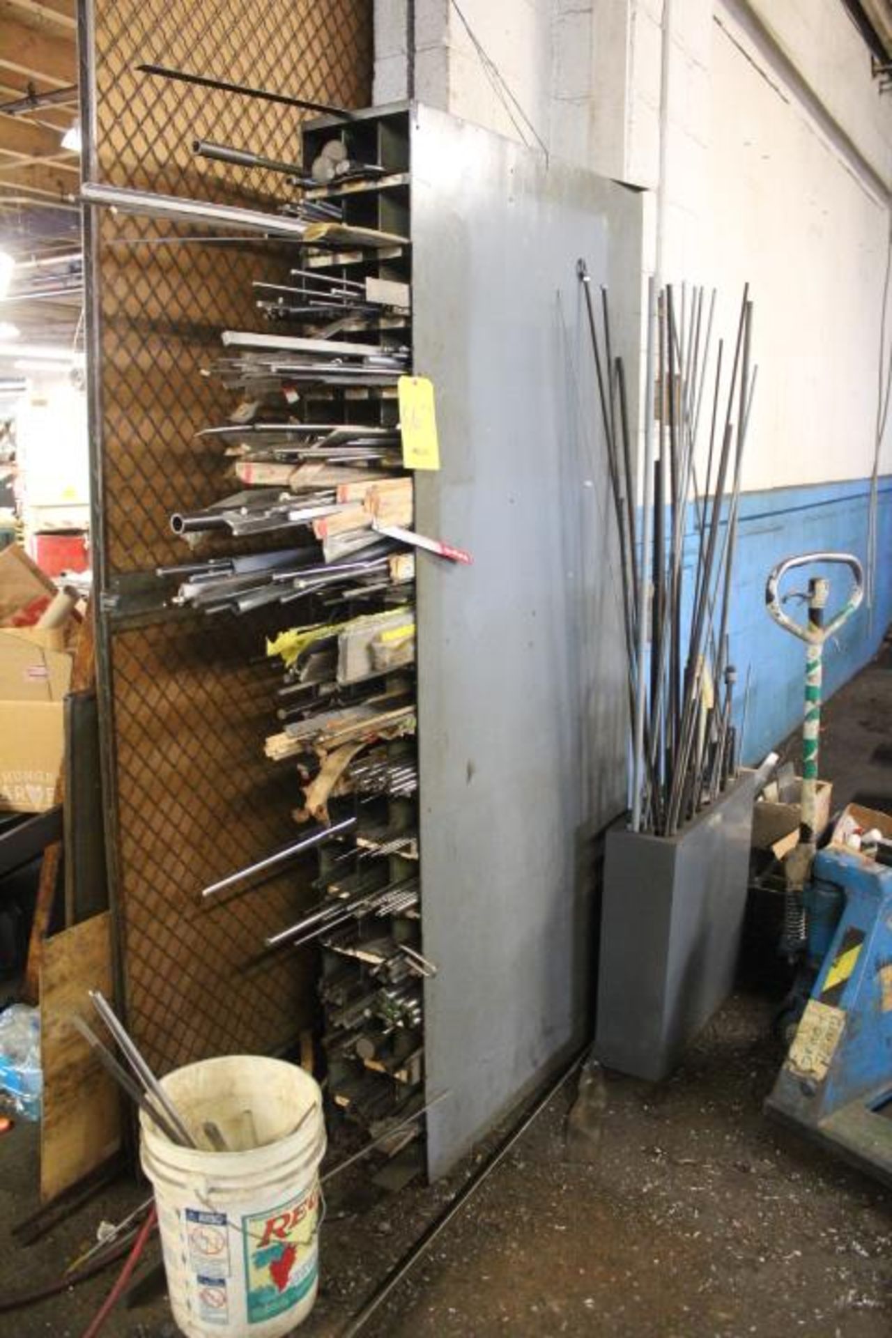 ASSORTED RACK WITH STAINLESS, ALUMINUM AND STEEL BARS, RODS, MISC. STOCK