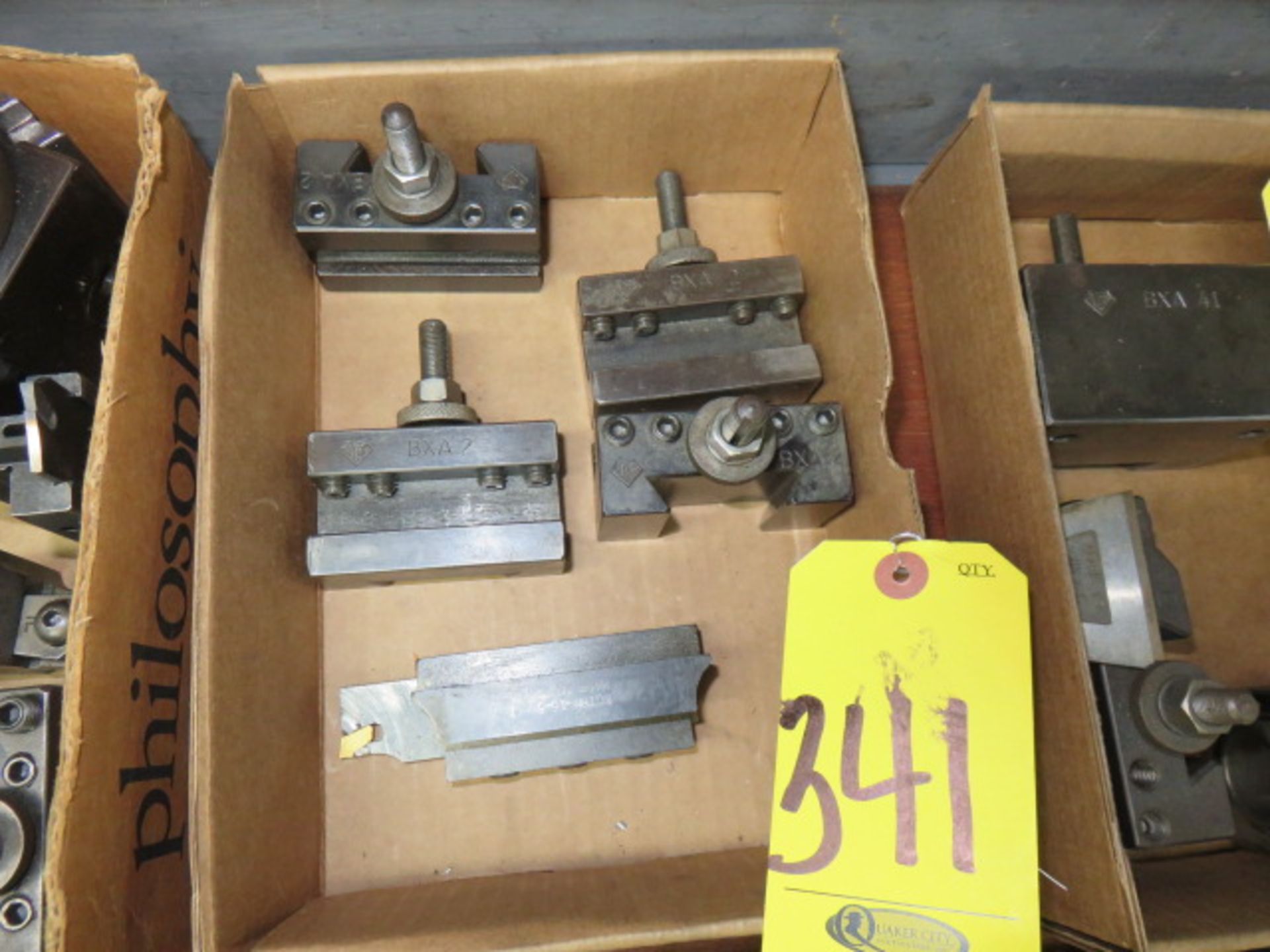 (4) BXA TOOL HOLDERS AND (1) CUT-OFF BLOCK