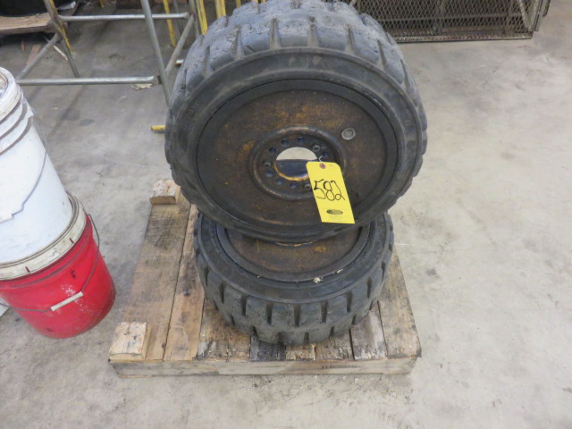 SET OF UNITRAC 22 X 8 X 16 SOLID FORK LIFT TIRES WITH RIMS