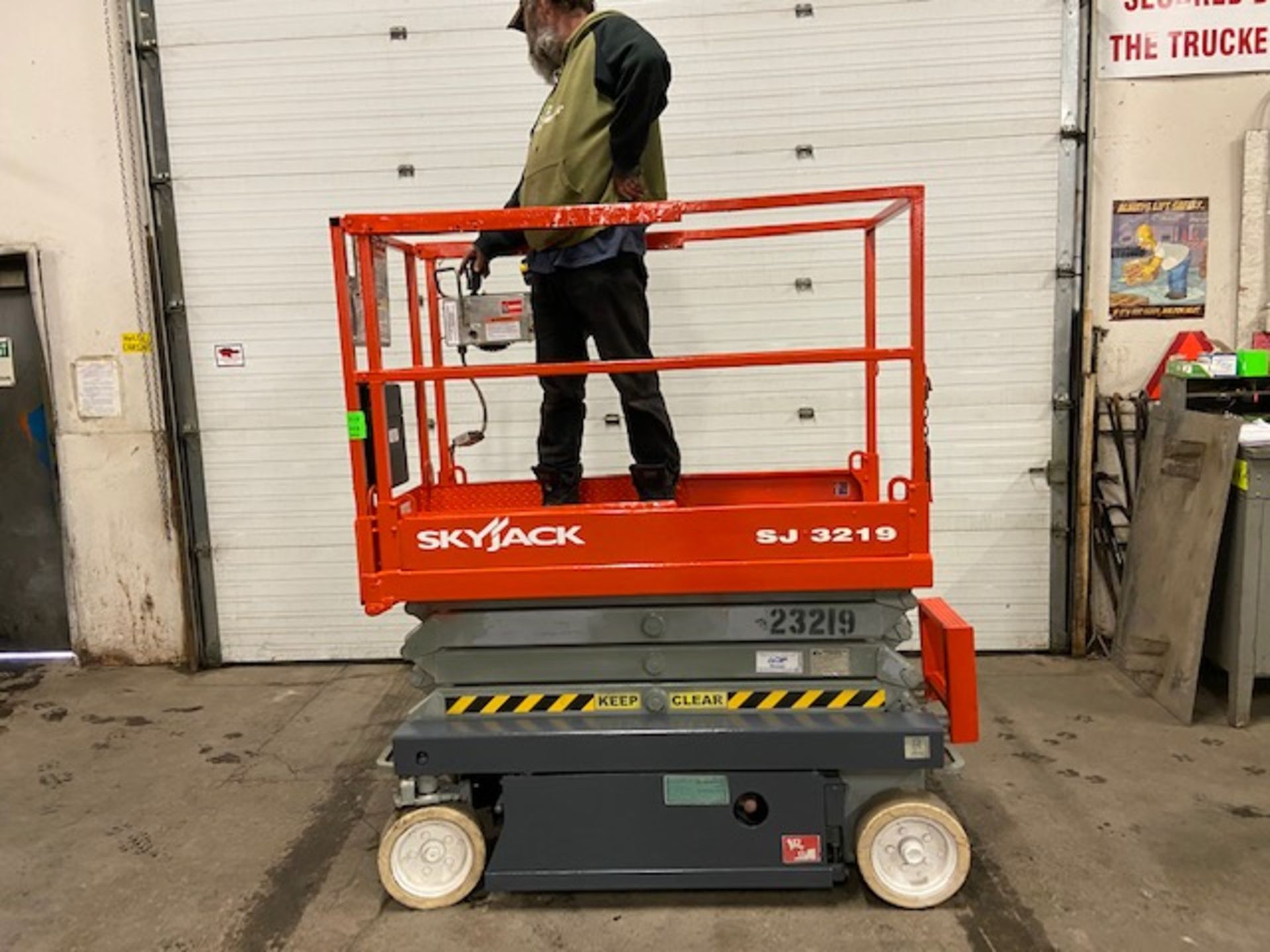 SkyJack III Electric Scissor Lift model 3219 - 19 feet lift, 32 inch width deck with pendant - Image 2 of 3