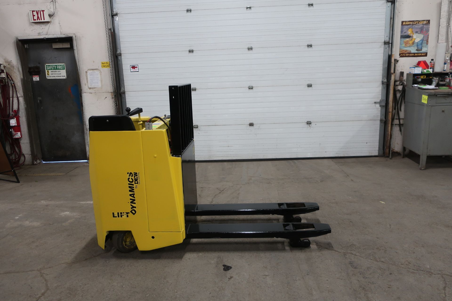 Dynamics Lift Sit down Electric Ride on Powered Pallet Cart Lift 6000lbs capacity safety into 2021