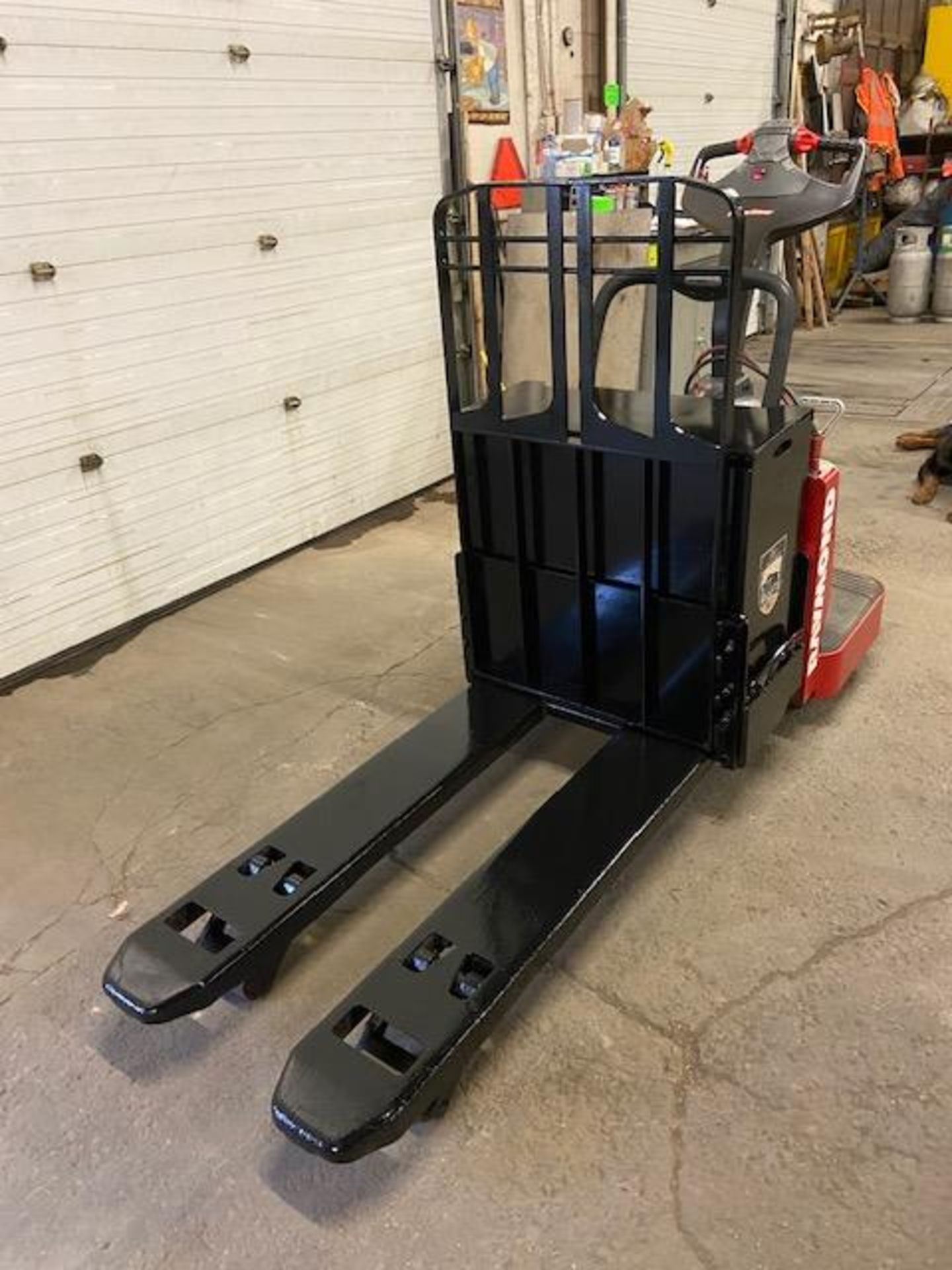 2012 Raymond Electric Ride on Powered Pallet Cart Lift with POWER STEERING 6000lbs capacity 4' - Image 3 of 3