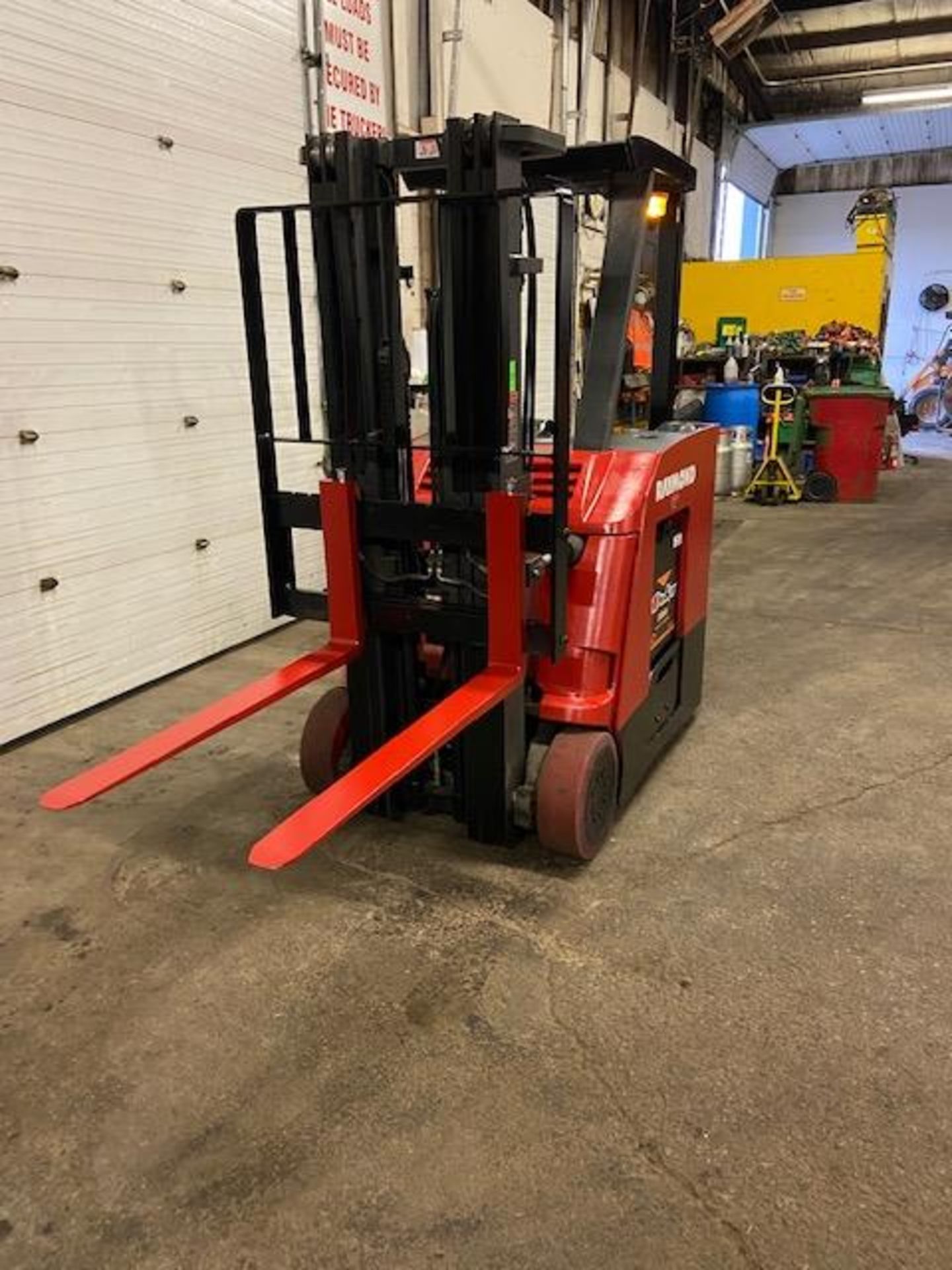 FREE CUSTOMS - 2015 Raymond 5000lbs Capacity Stand On Forklift Electric with 3-STAGE MAST sideshift - Image 2 of 3